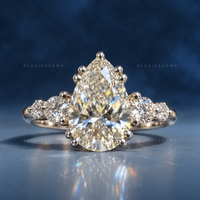 Luminous Majesty Pear Cut Five Stone Double Prong Engagement Ring