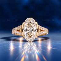 Modern Half Bezel Oval Cut Pavé Engagement Ring