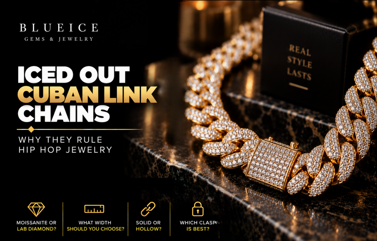 Solid gold iced out Cuban link chain with pavé-set stones and a large clasp on a black luxury jewelry surface.