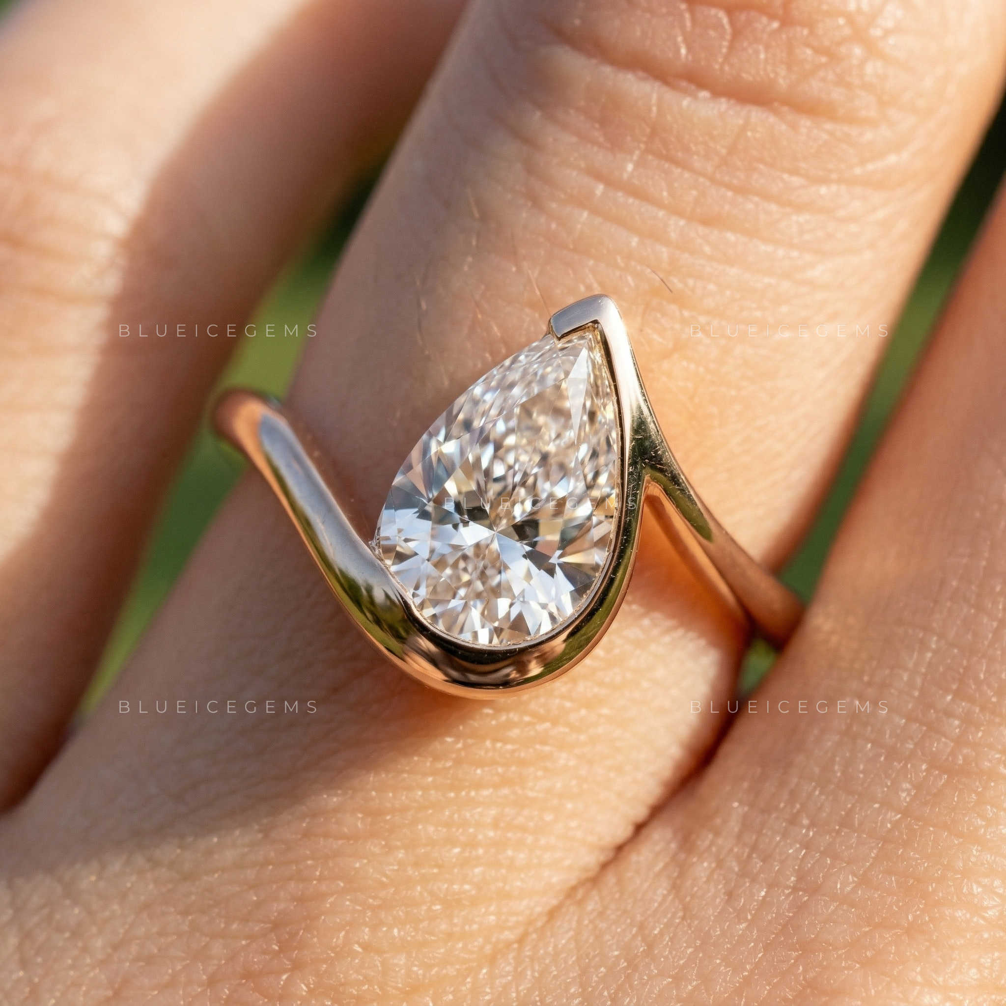 The "Signature Silhouette" Pear Cut Bezel Solitaire: Modern Icon