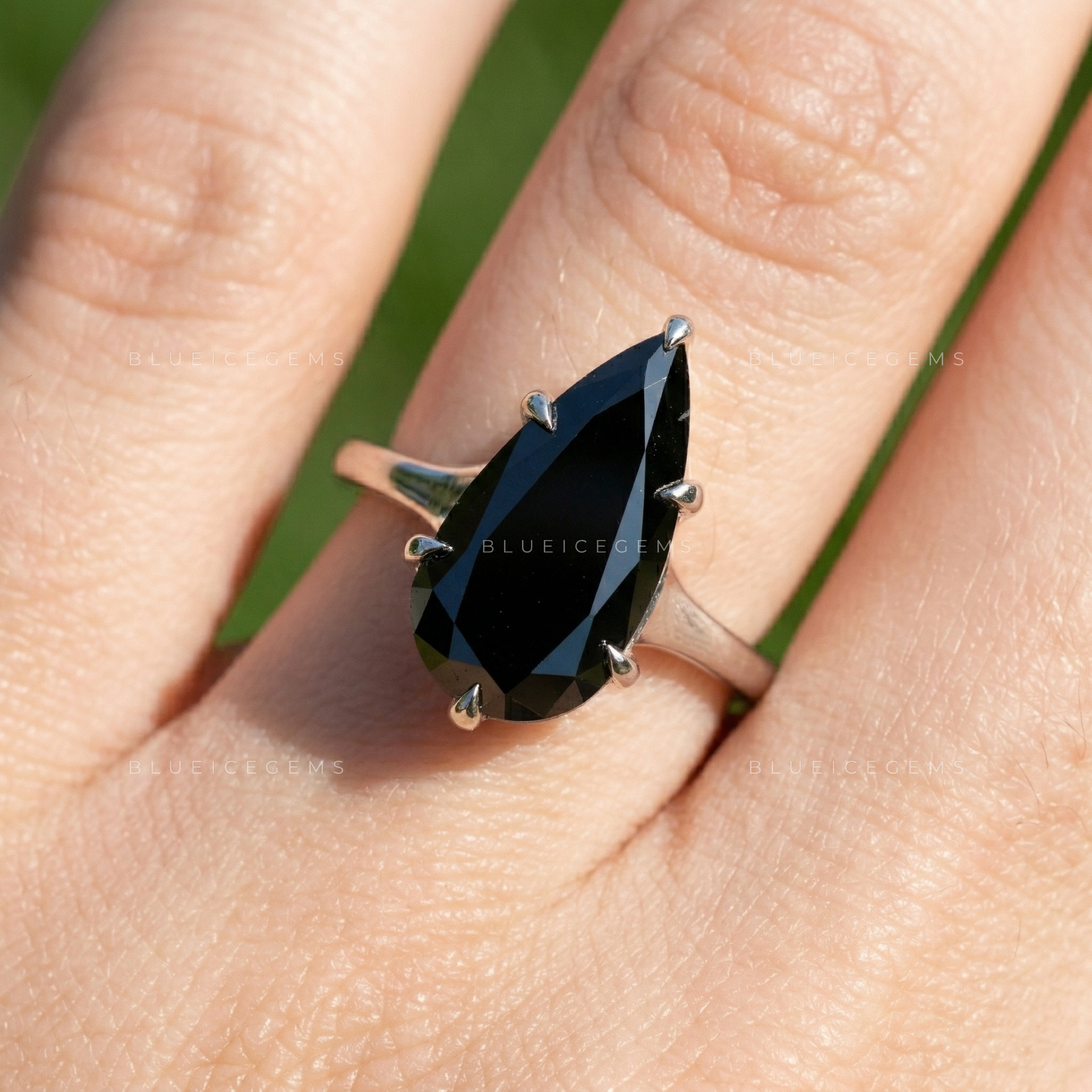 Midnight Noir Pear Cut Moissanite Solitaire Ring