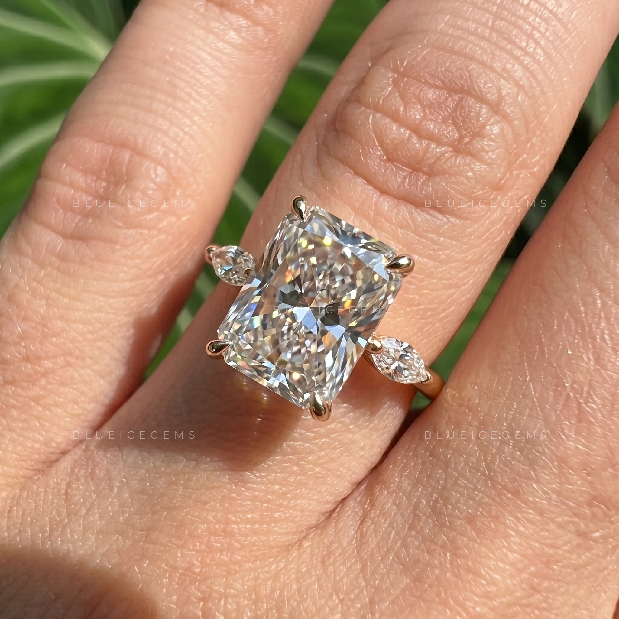 Radiant Cut Three Stone Engagement Ring with Marquise Side Accents
