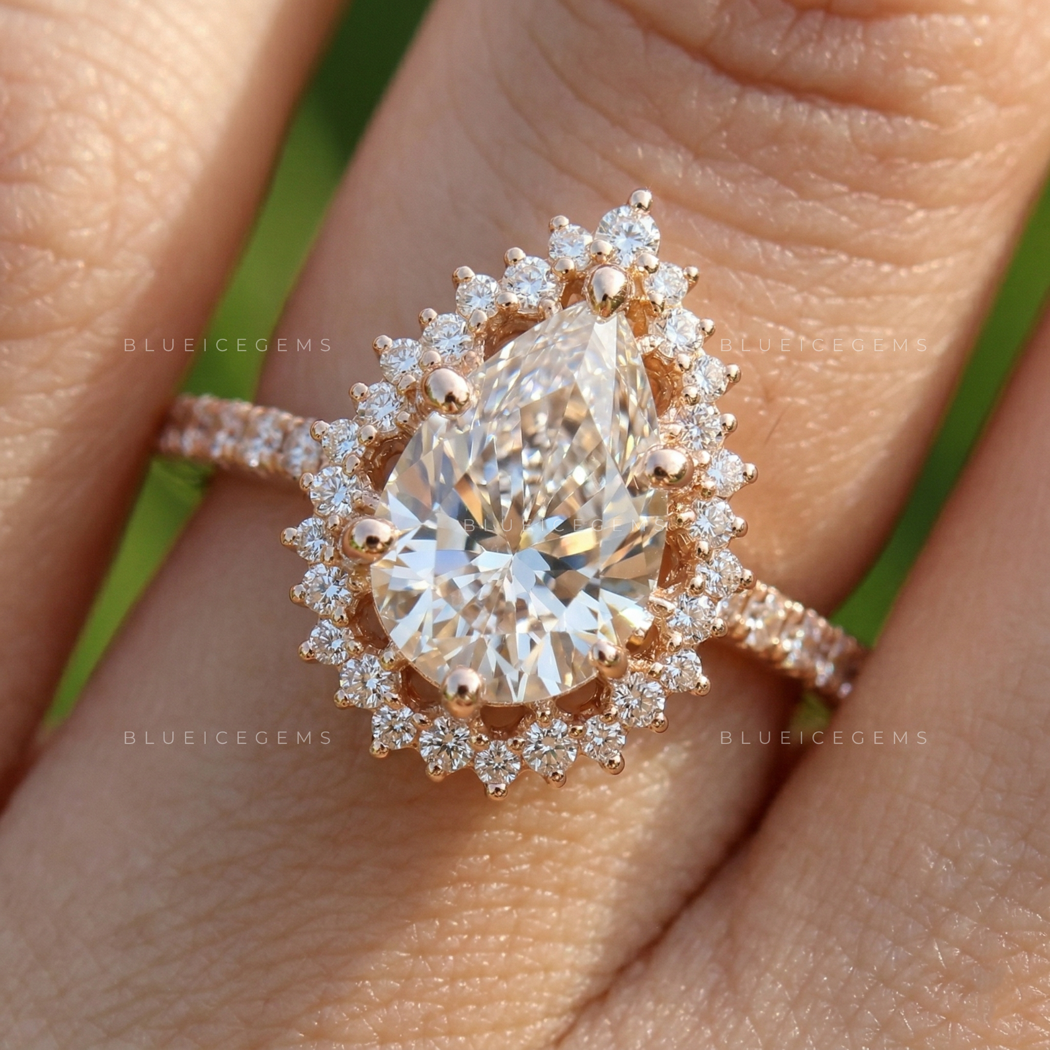 Graceful Pear Cut Halo Side Stone Engagement Ring