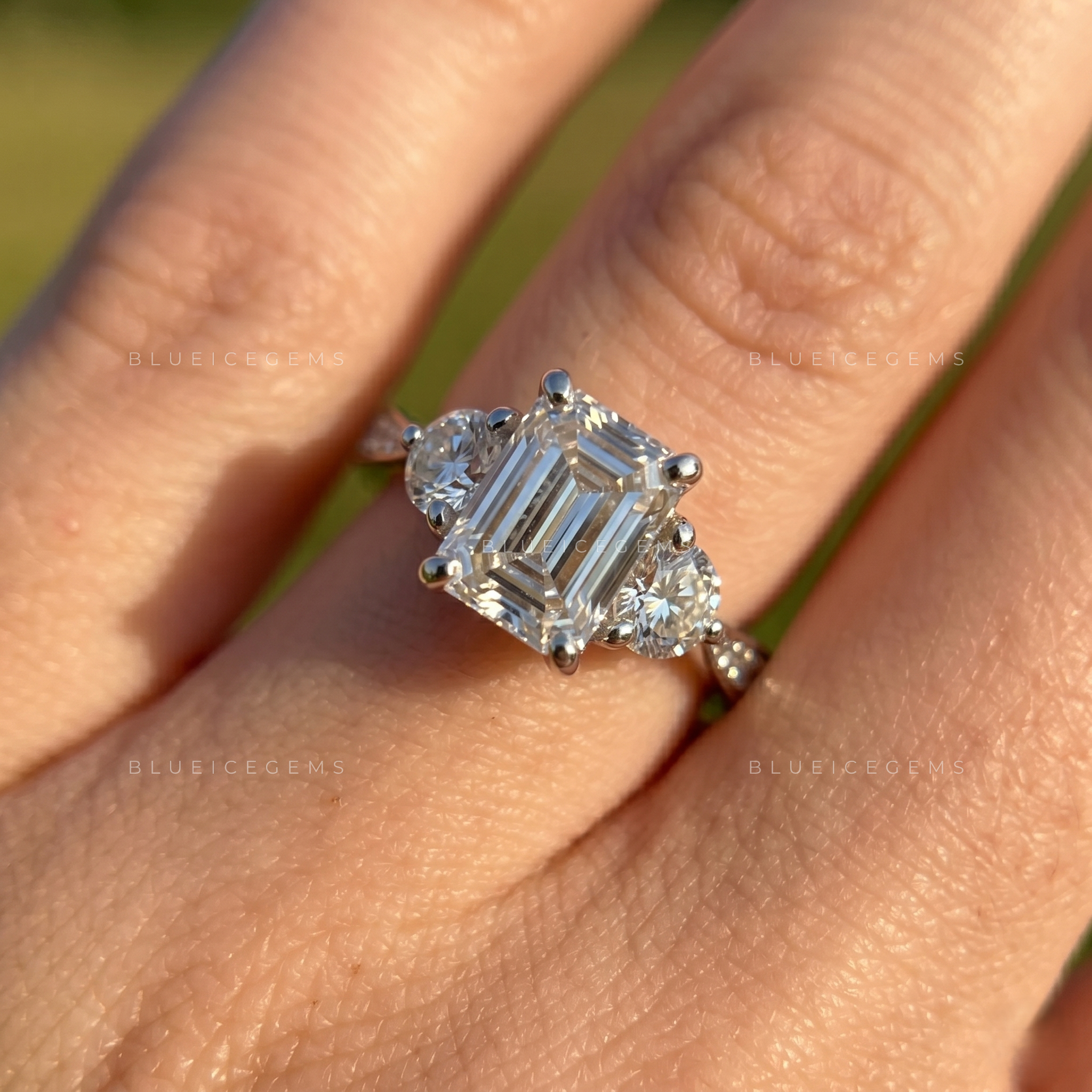 Sophisticated Elegance Elongated Emerald Cut Solitaire with Tapered Accent Band Anniversary Ring