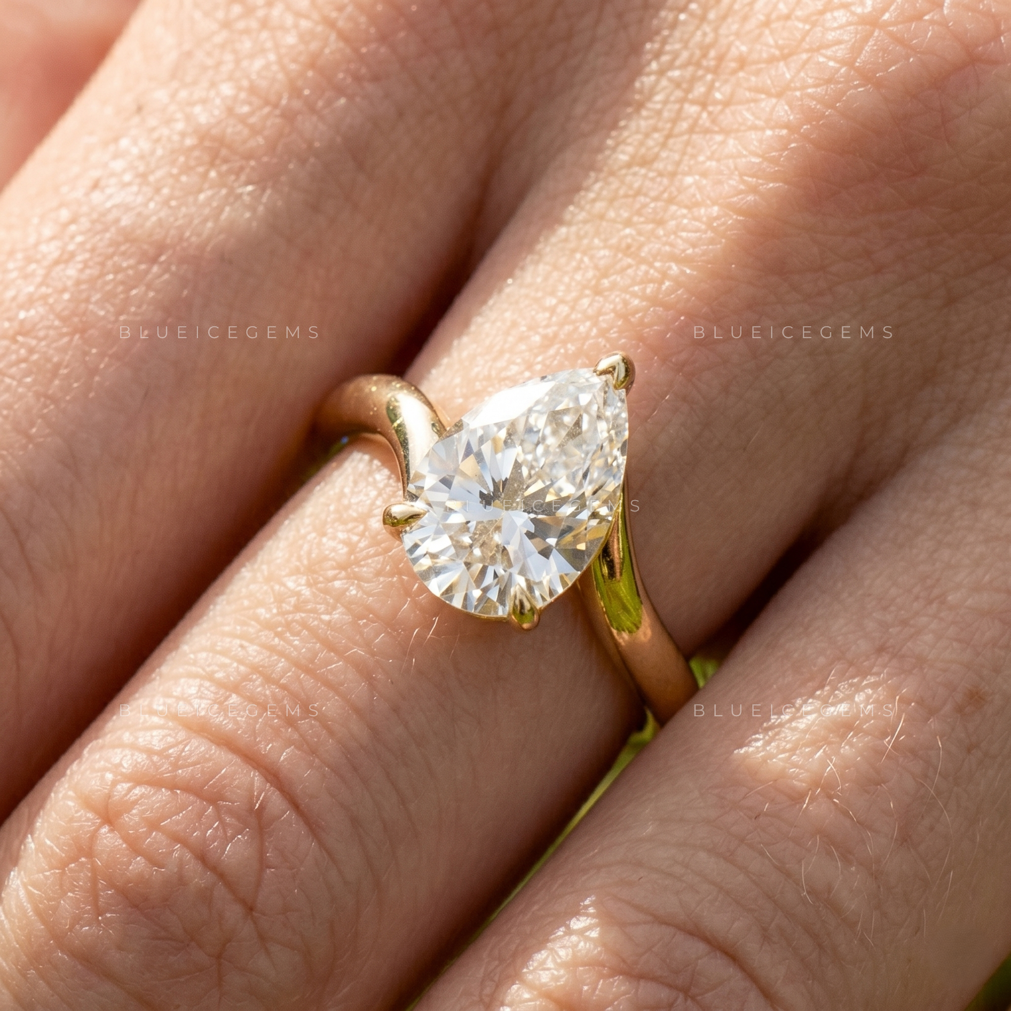 Lunara Tilted Pear Cut East-West Bypass Solitaire Ring