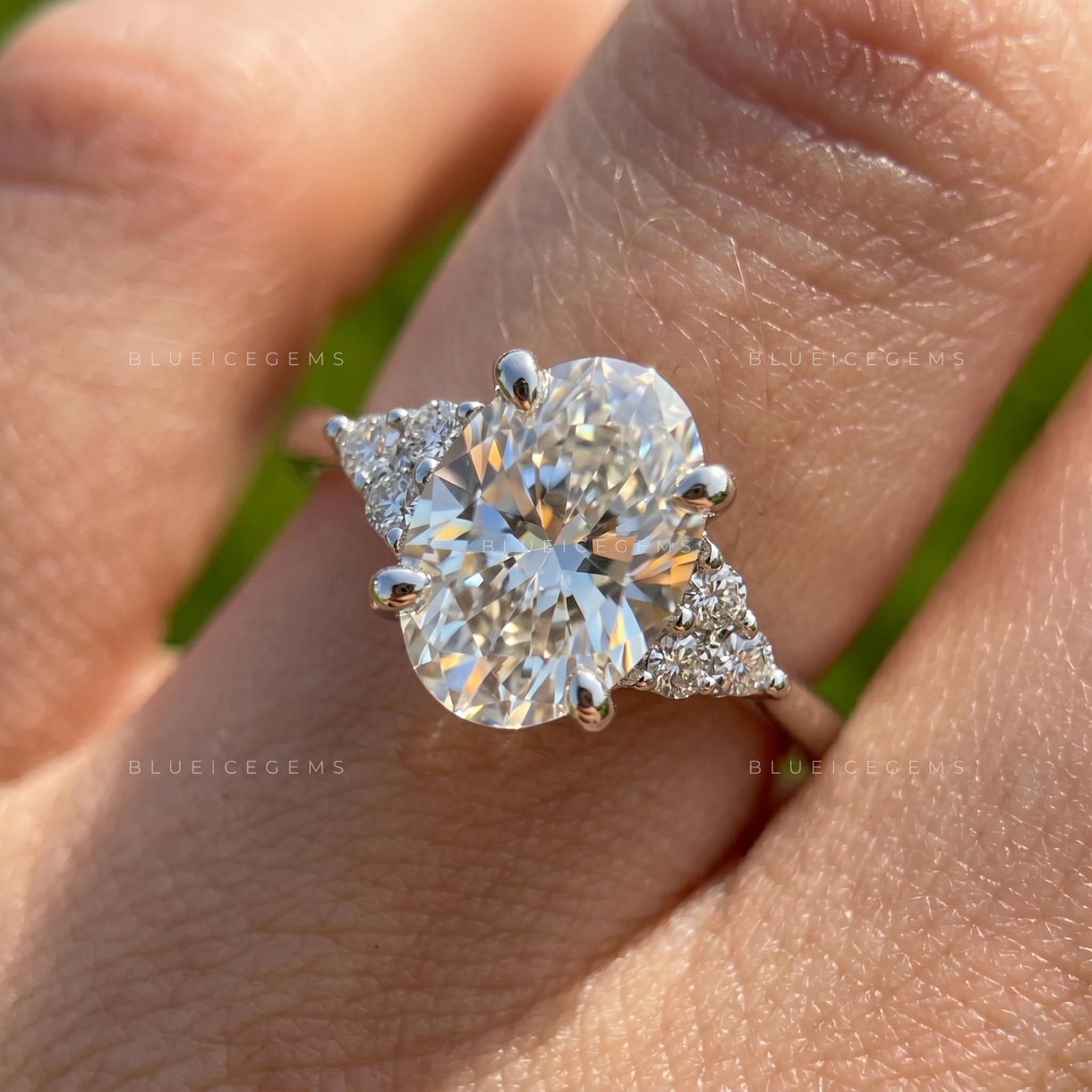 Elegant Oval Brilliant Cut Solitaire Ring with Side Accents