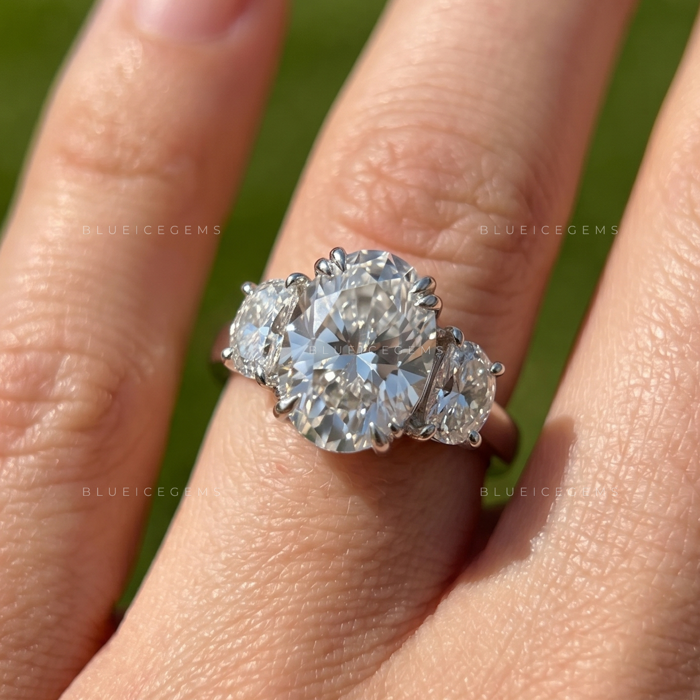 Elegant Symphony Oval Brilliant Cut and Half Moon Three Stone Engagement Ring