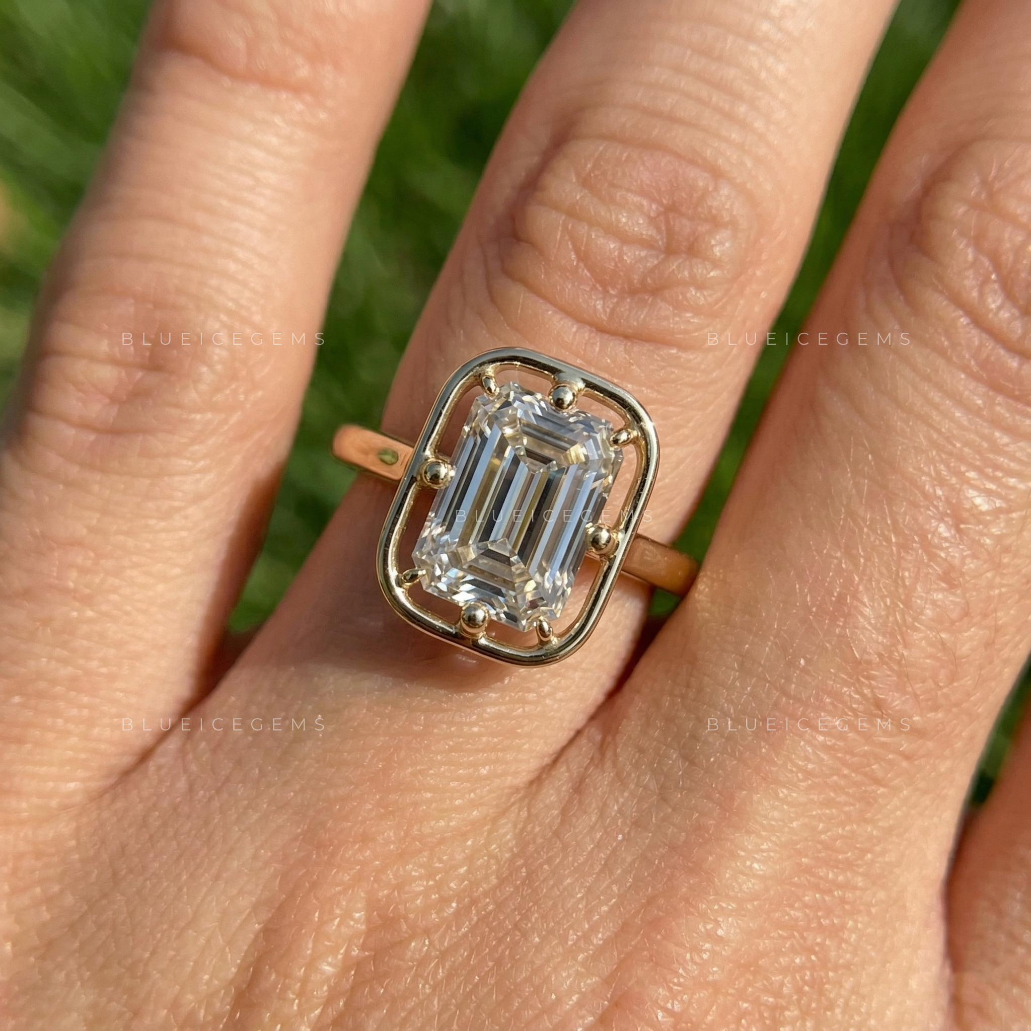 Refined Emerald Cut Solitaire Open Gallery Engagement Ring