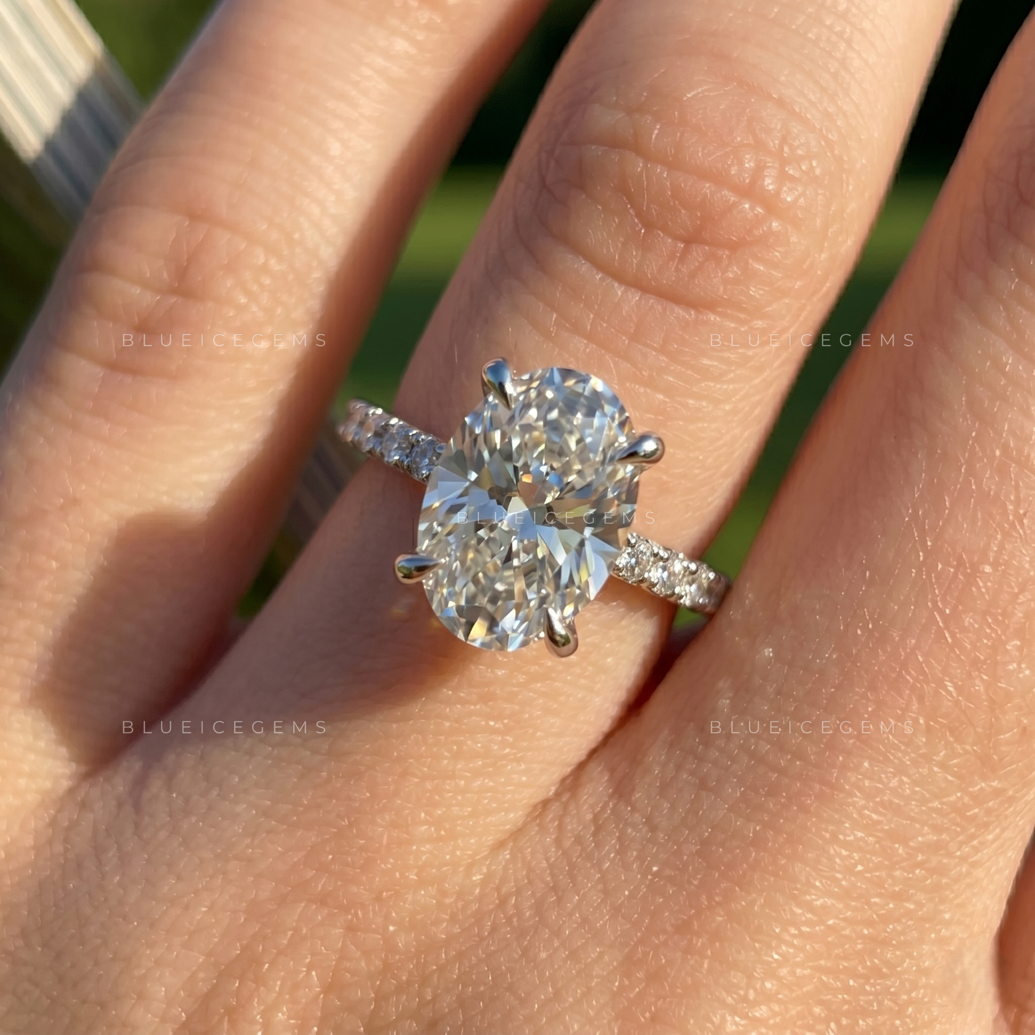 Radiant Oval Brilliant Cut Solitaire Ring with Sparkling Pave Accents