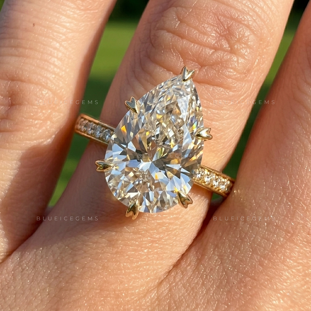 The "Signature Teardrop" Pear & Round Halo: Bold Elegance