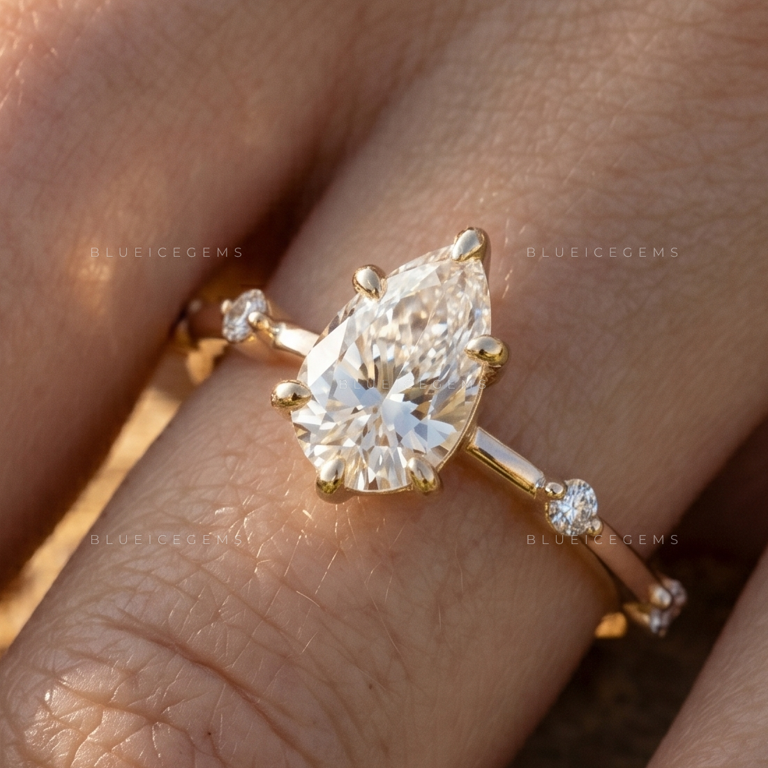 Elegant Grace Pear Cut Five Stone Accent Engagement Ring