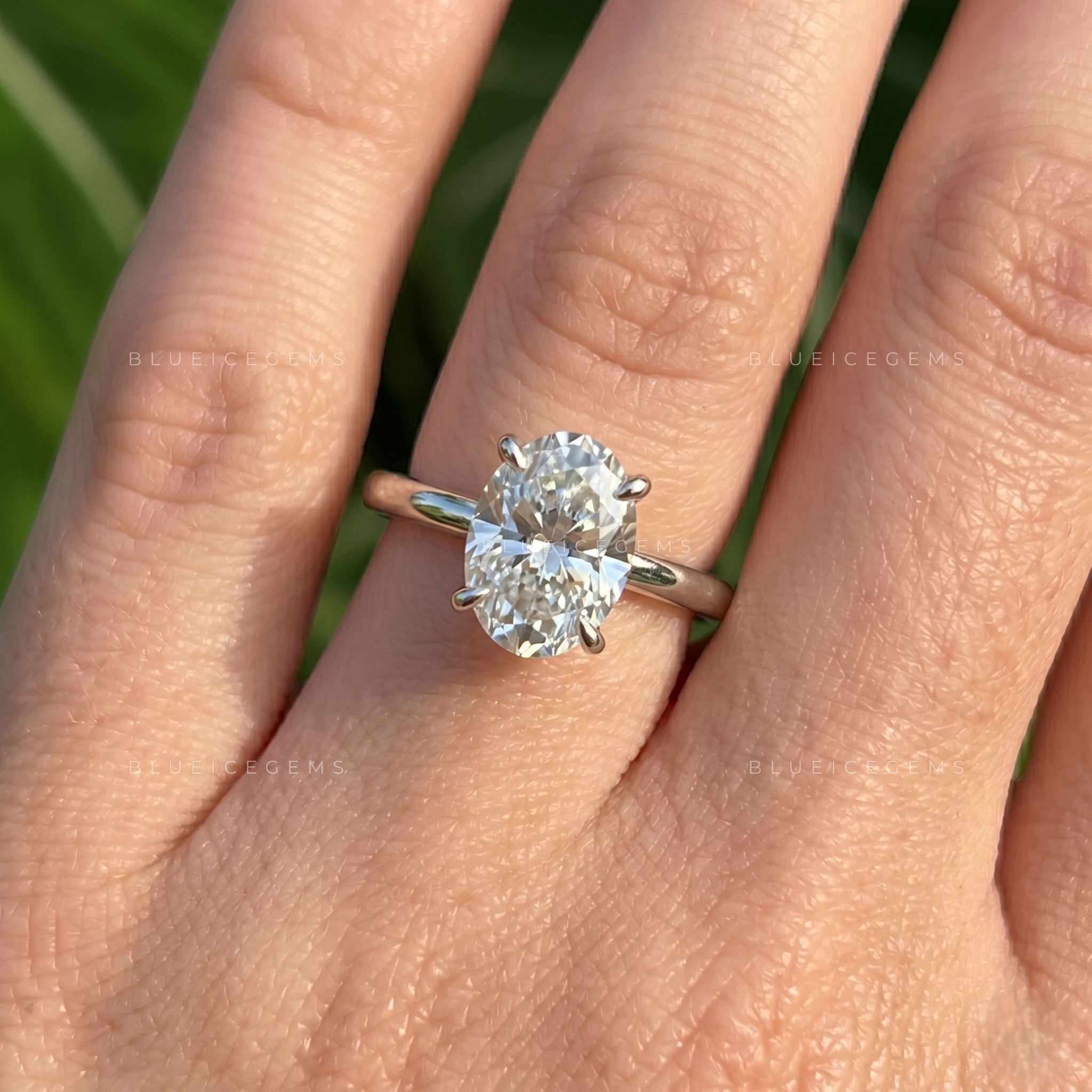 Graceful Oval Brilliant Cut Claw Prong Solitaire Engagement Ring