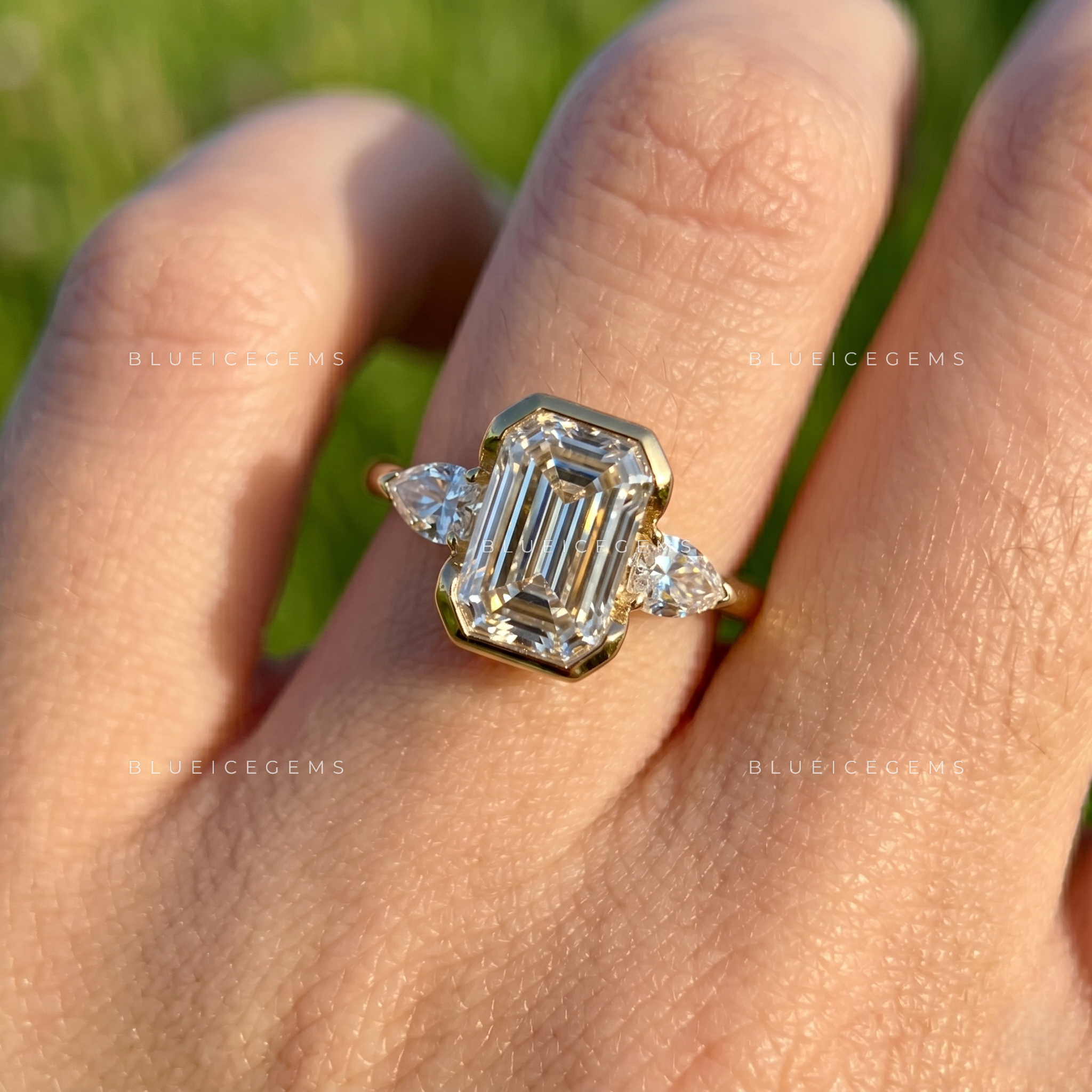Majestic East-West Emerald Cut Pear Three-Stone Engagement Ring
