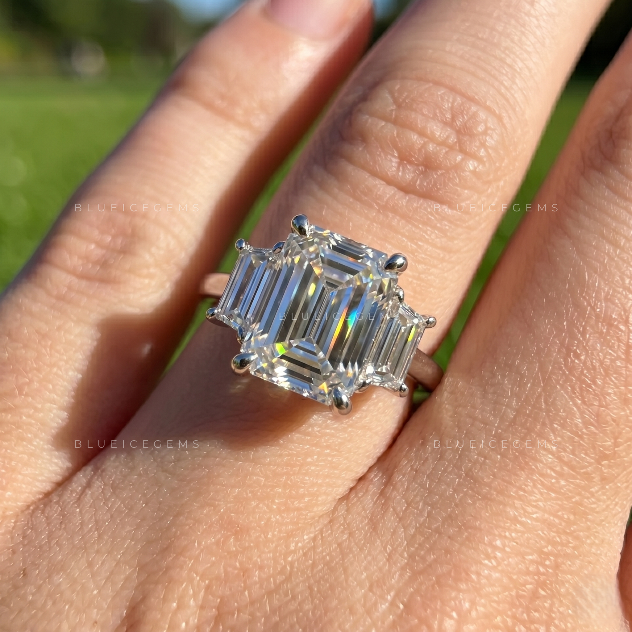 Majestic Symmetry Emerald Cut Three-Stone Engagement Ring