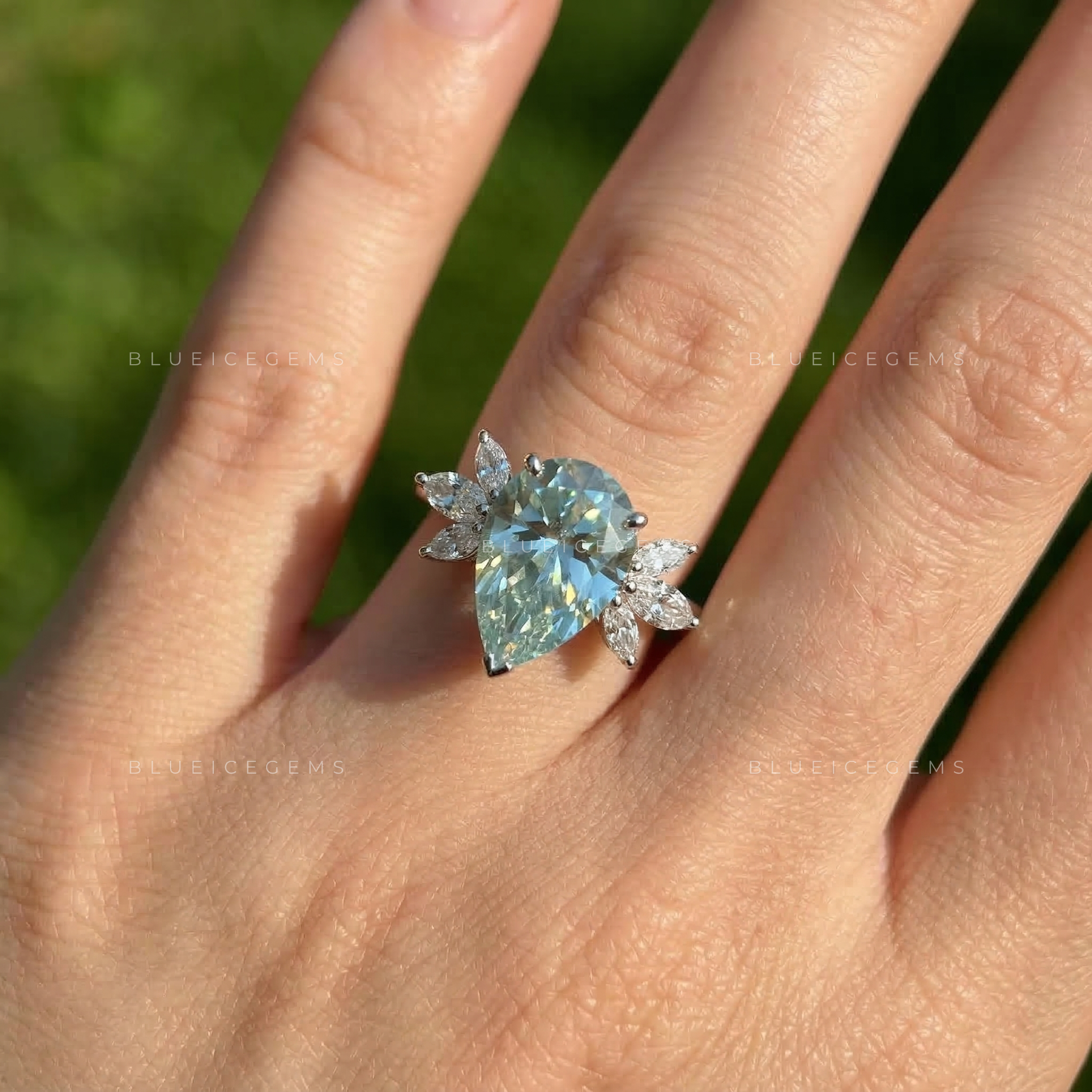 Azure Serenity Pear Cut Marquise Seven Stone Ring