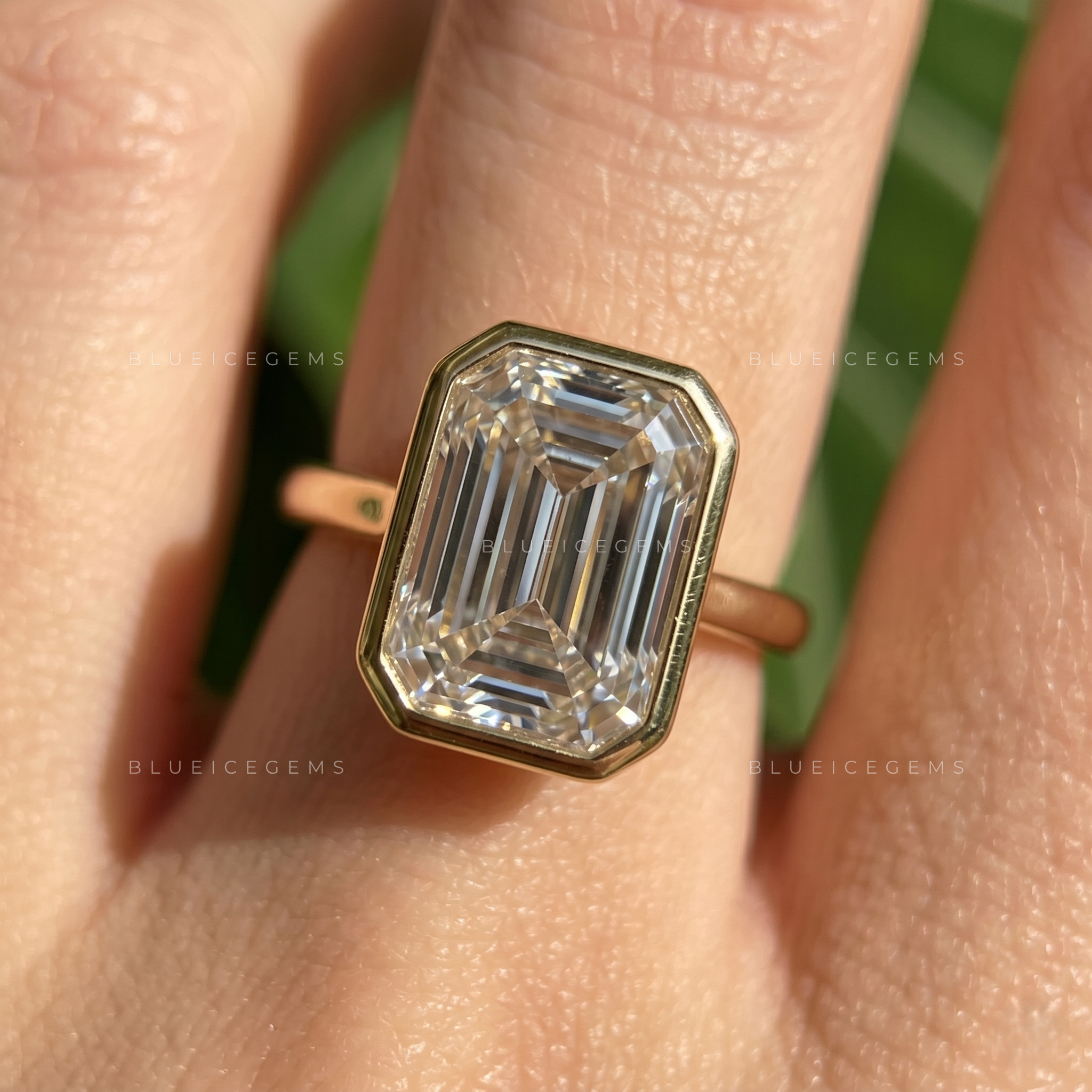 Sleek Modernity Emerald Cut Full Bezel Solitaire Engagement Ring
