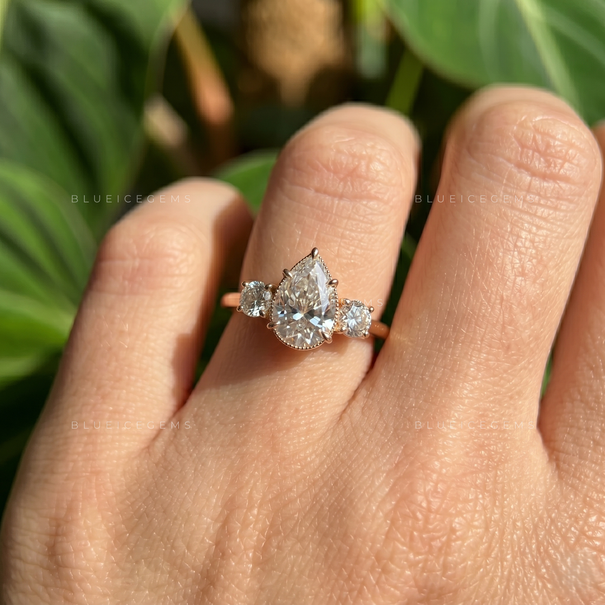 Whispering Romance Pear Cut Three-Stone Engagement Ring