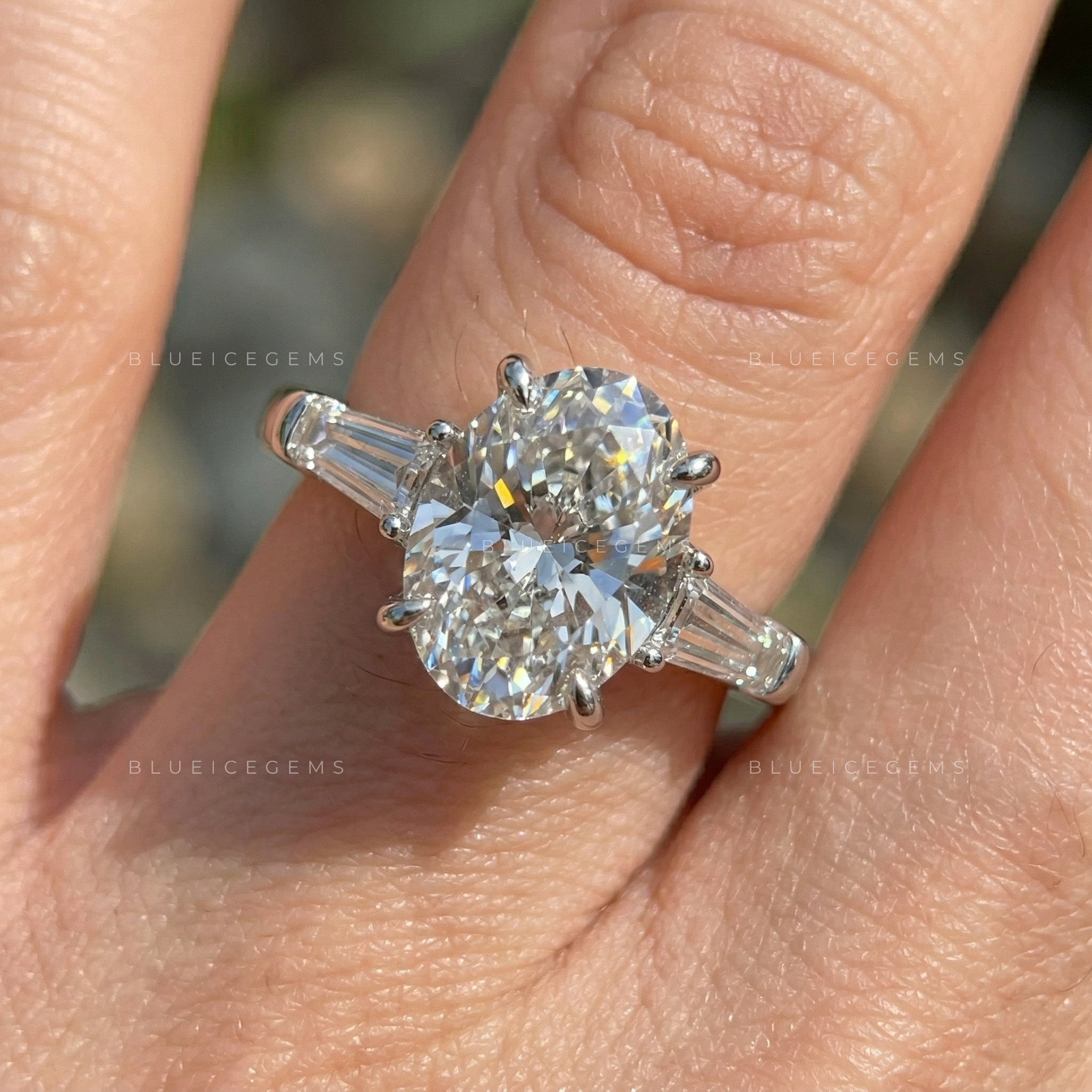Timeless Elegance Oval and Tapered Baguette Trilogy Engagement Ring