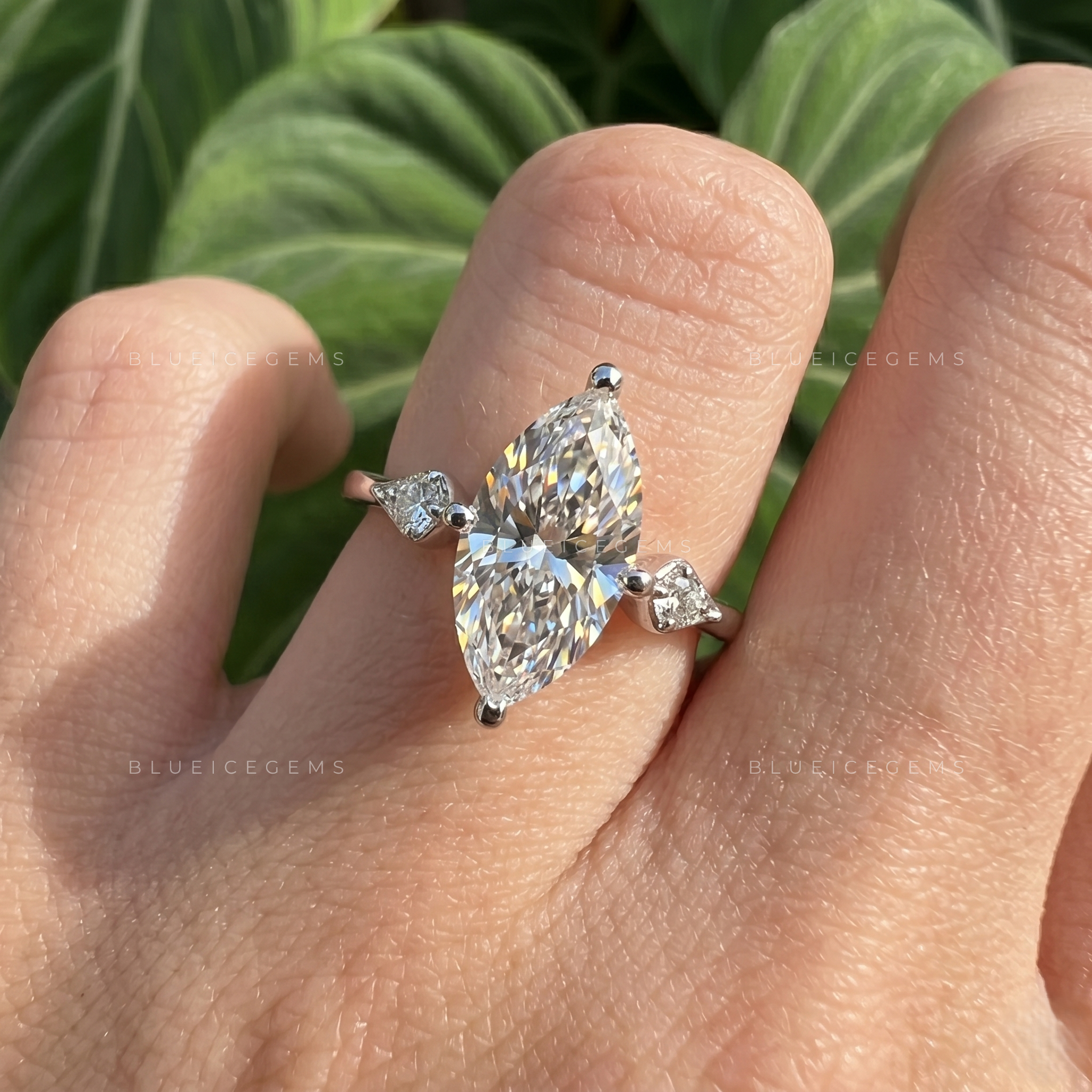 Majestic Elegance Marquise Cut Three-Stone Trilogy Engagement Ring