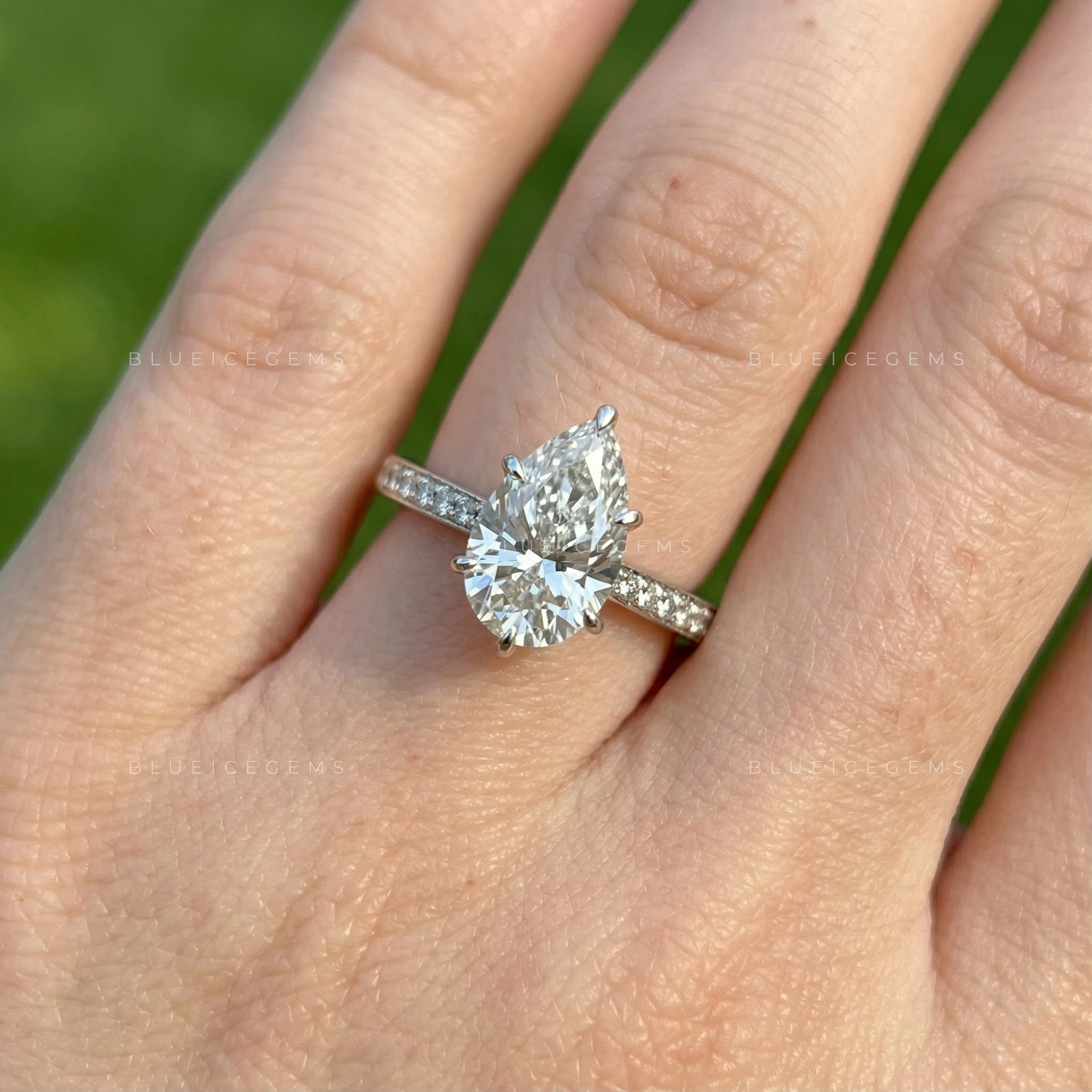 Graceful Radiance Pear Cut Hidden Accent Engagement Ring
