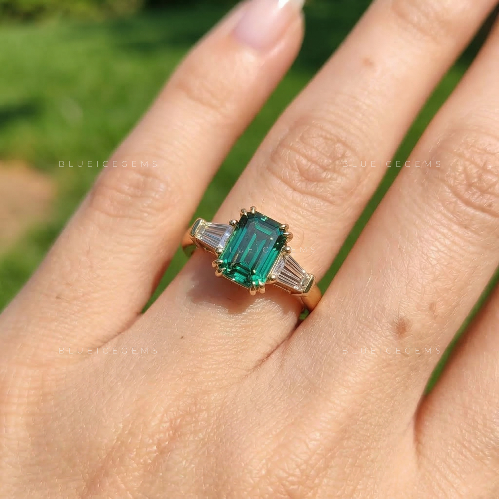 Verdant Elegance Emerald Cut Three-Stone Ring