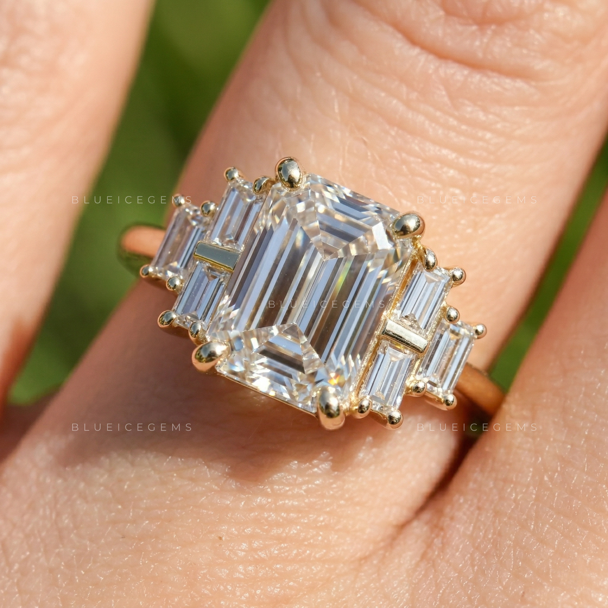 Elegant Emerald Cut Three Stone Side Baguette Engagement Ring