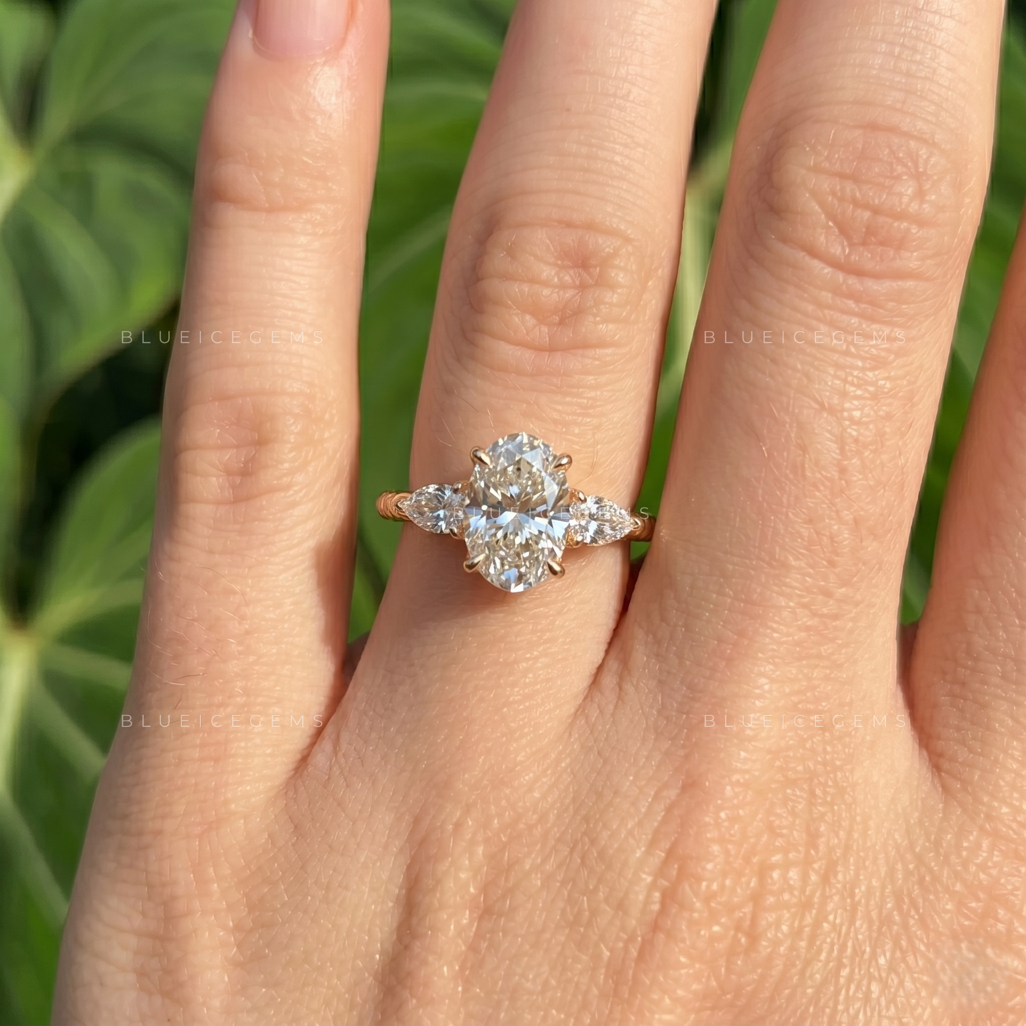 Elegance Unveiled Oval Cut Trilogy Engagement Ring with Pear Accents