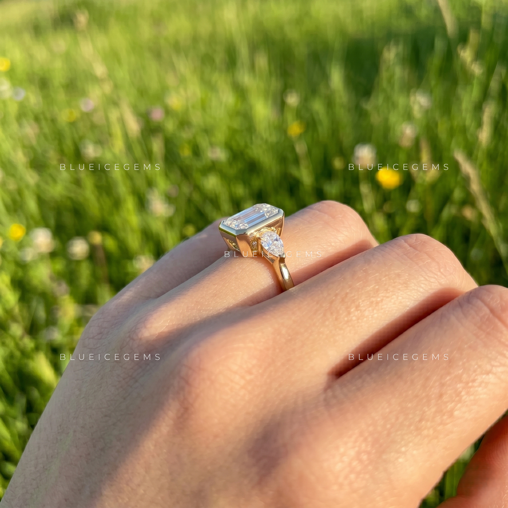 Majestic East-West Emerald Cut Pear Three-Stone Engagement Ring