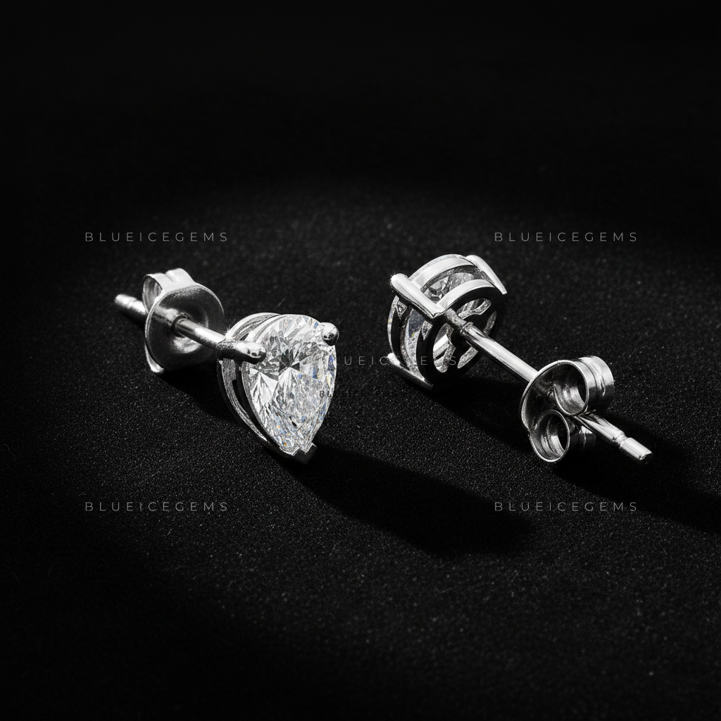 The Teardrop Zenith: Pear Diamond Stud Earrings