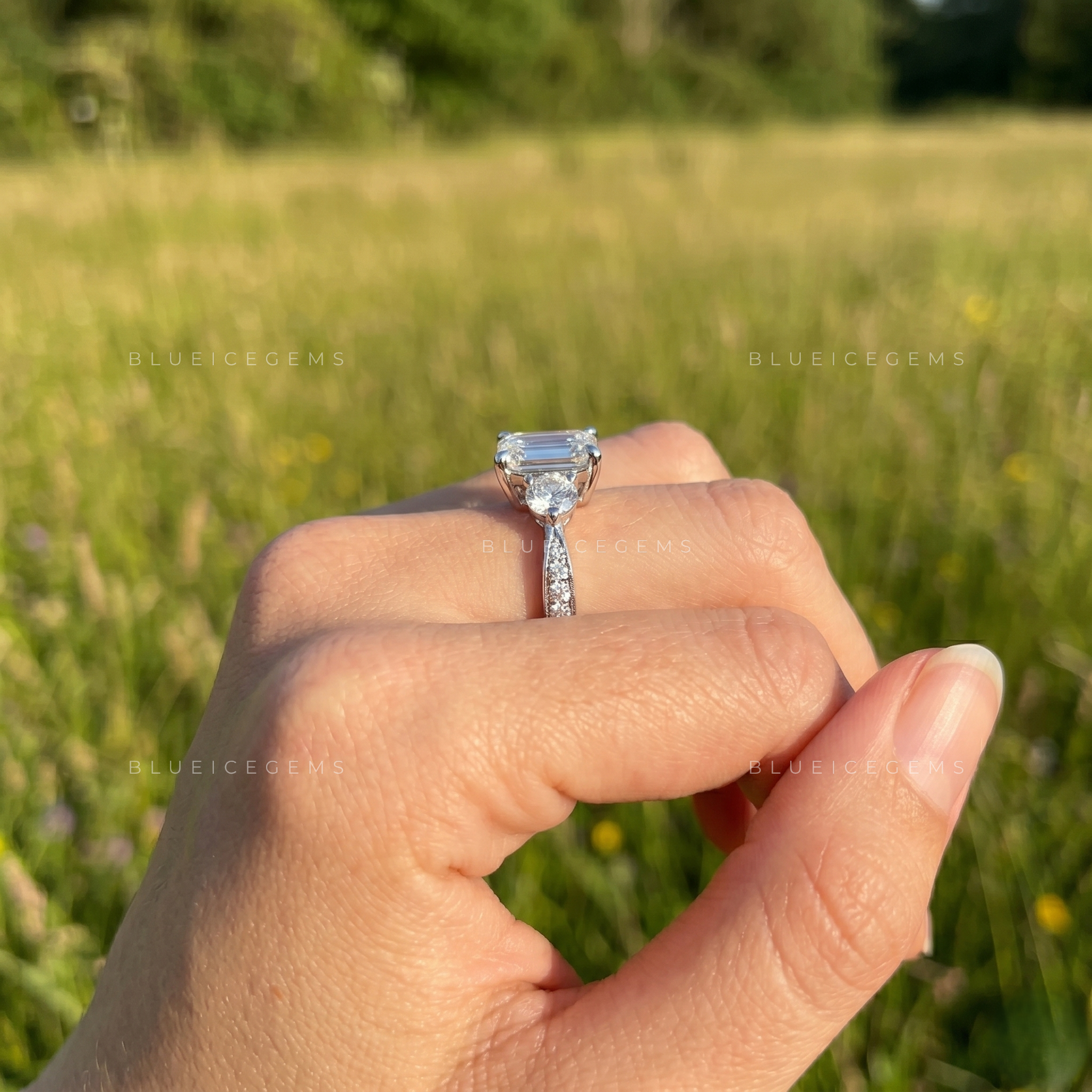Sophisticated Elegance Elongated Emerald Cut Solitaire with Tapered Accent Band Anniversary Ring