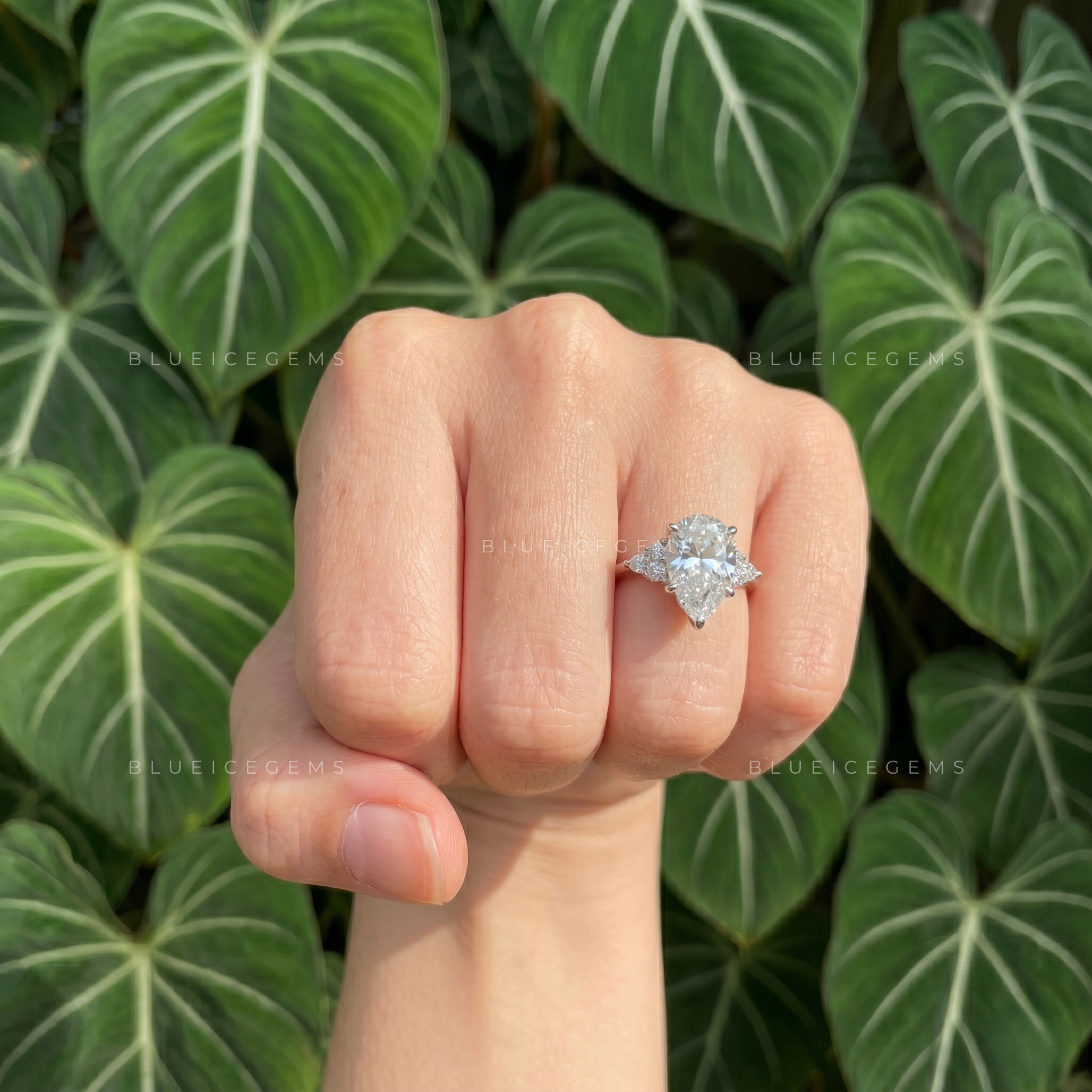 Enchanting Grace Pear Cut Claw Prong Solitaire Engagement Ring