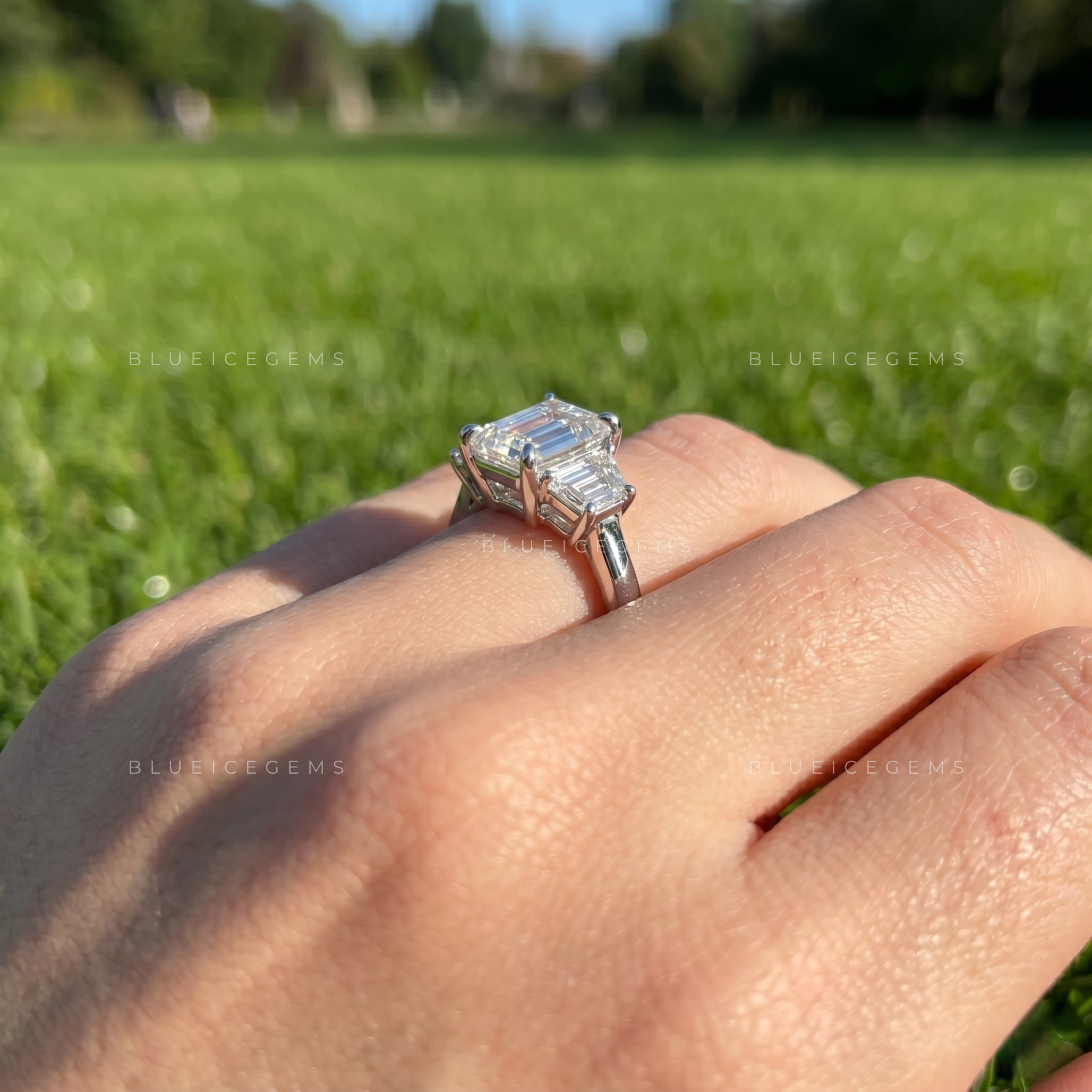 Majestic Symmetry Emerald Cut Three-Stone Engagement Ring