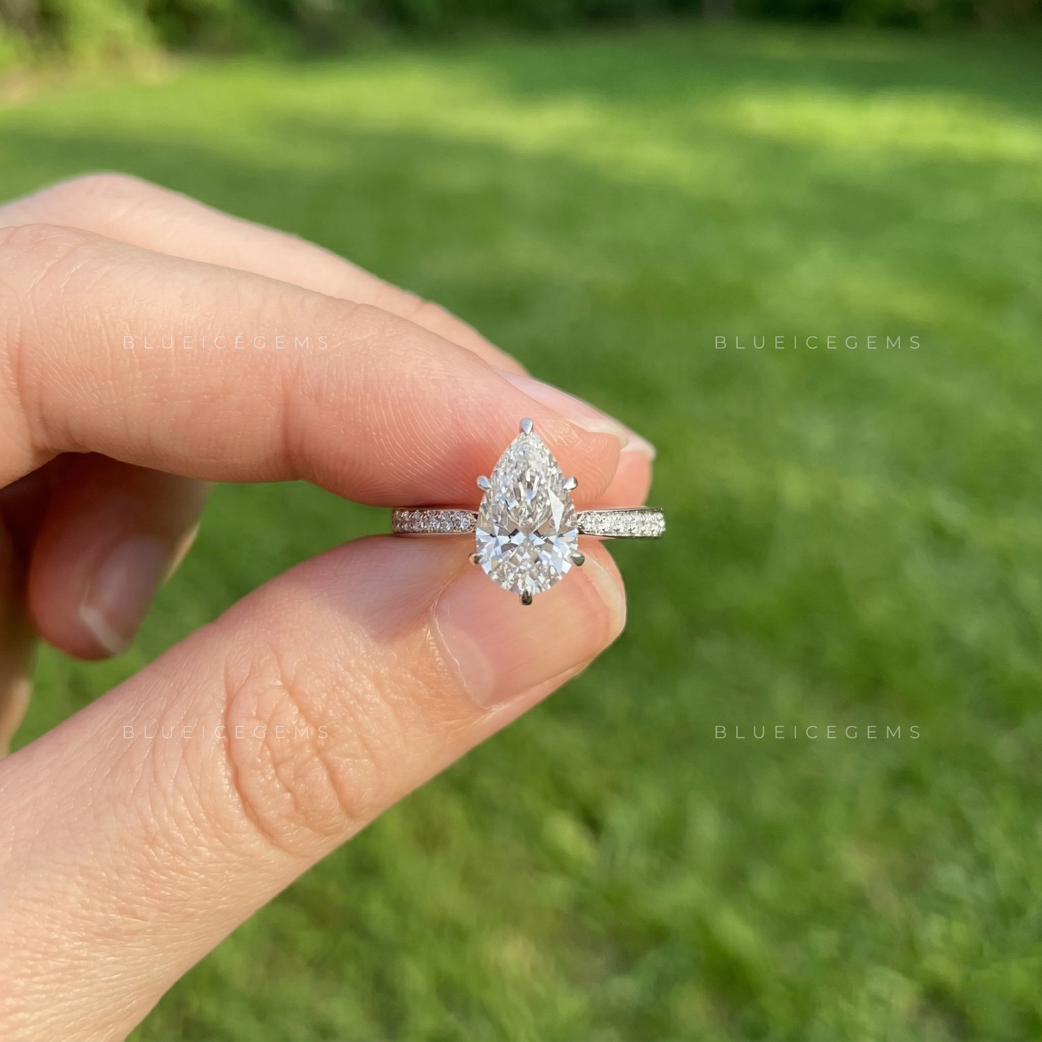 Graceful Radiance Pear Cut Hidden Accent Engagement Ring