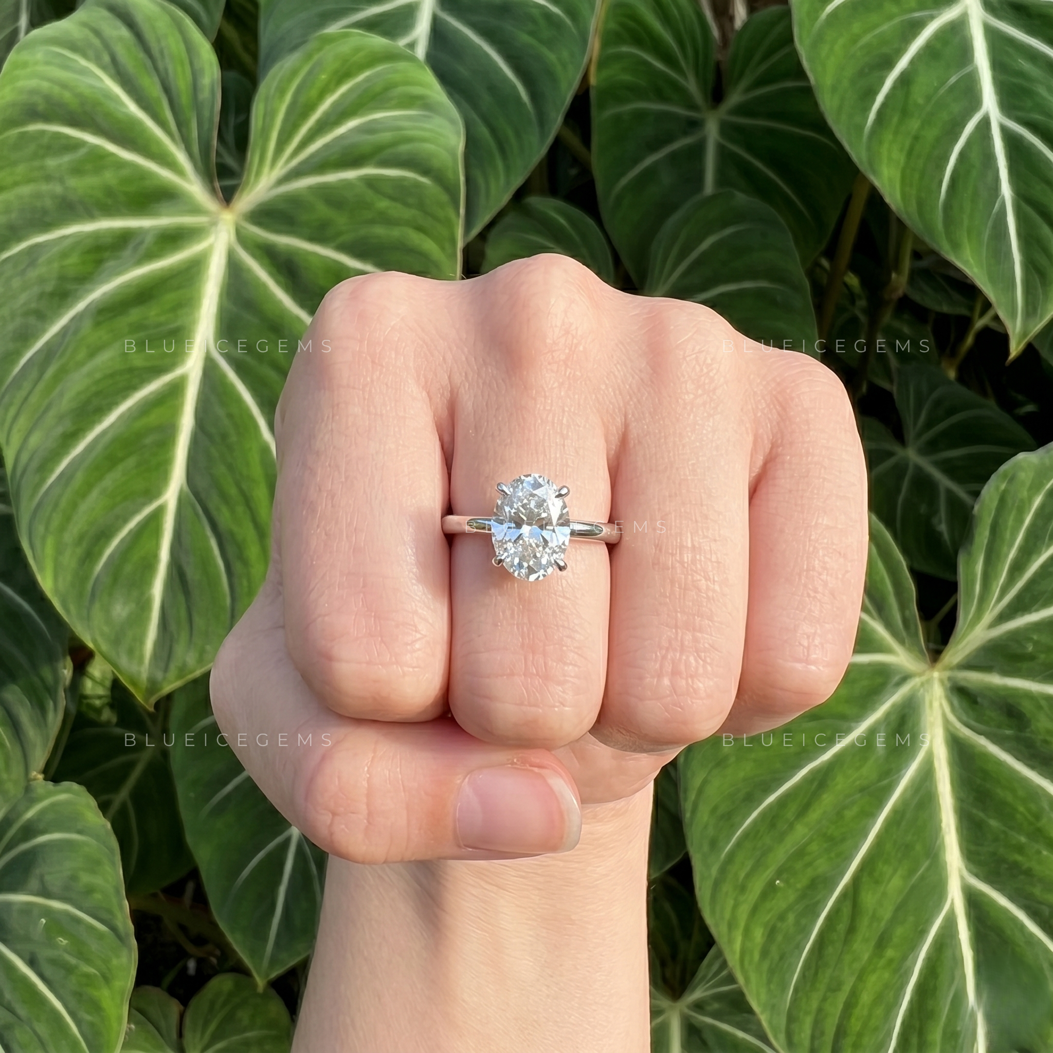 Graceful Oval Brilliant Cut Claw Prong Solitaire Engagement Ring