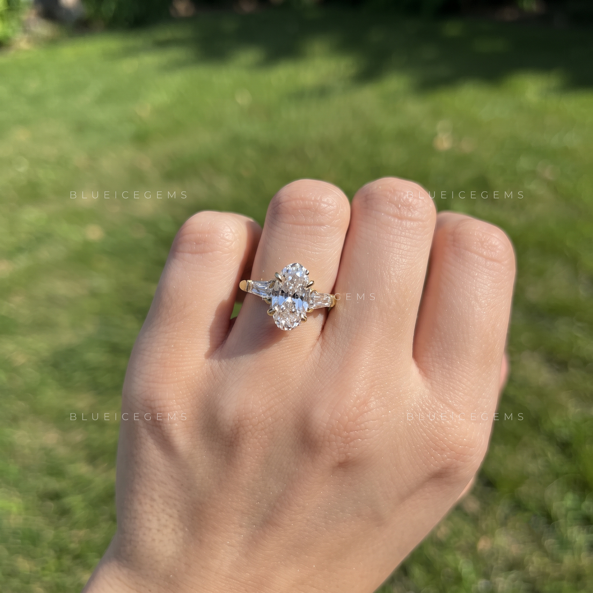 Moval Grace Three-Stone Tapered Baguette Engagement Ring