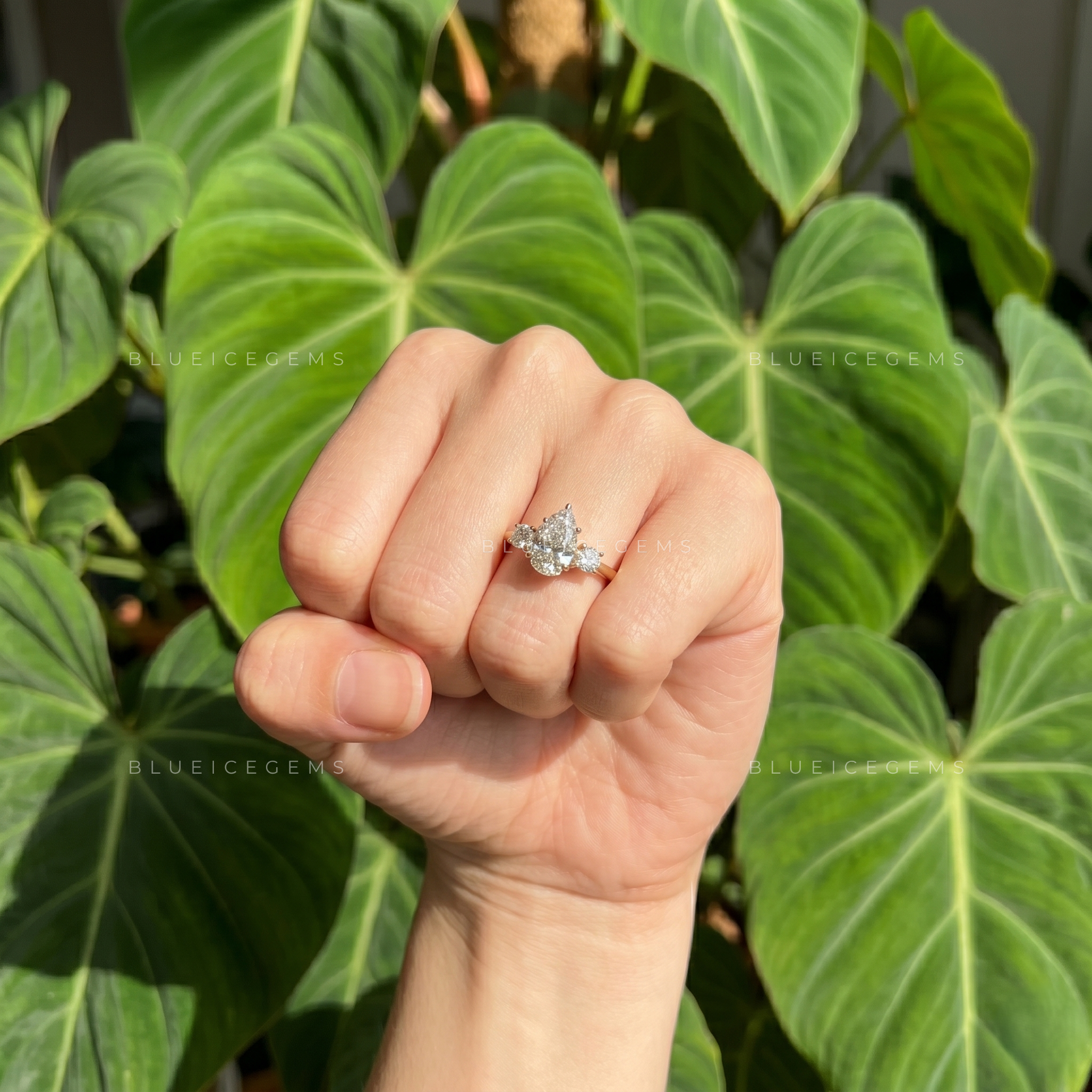 Whispering Romance Pear Cut Three-Stone Engagement Ring