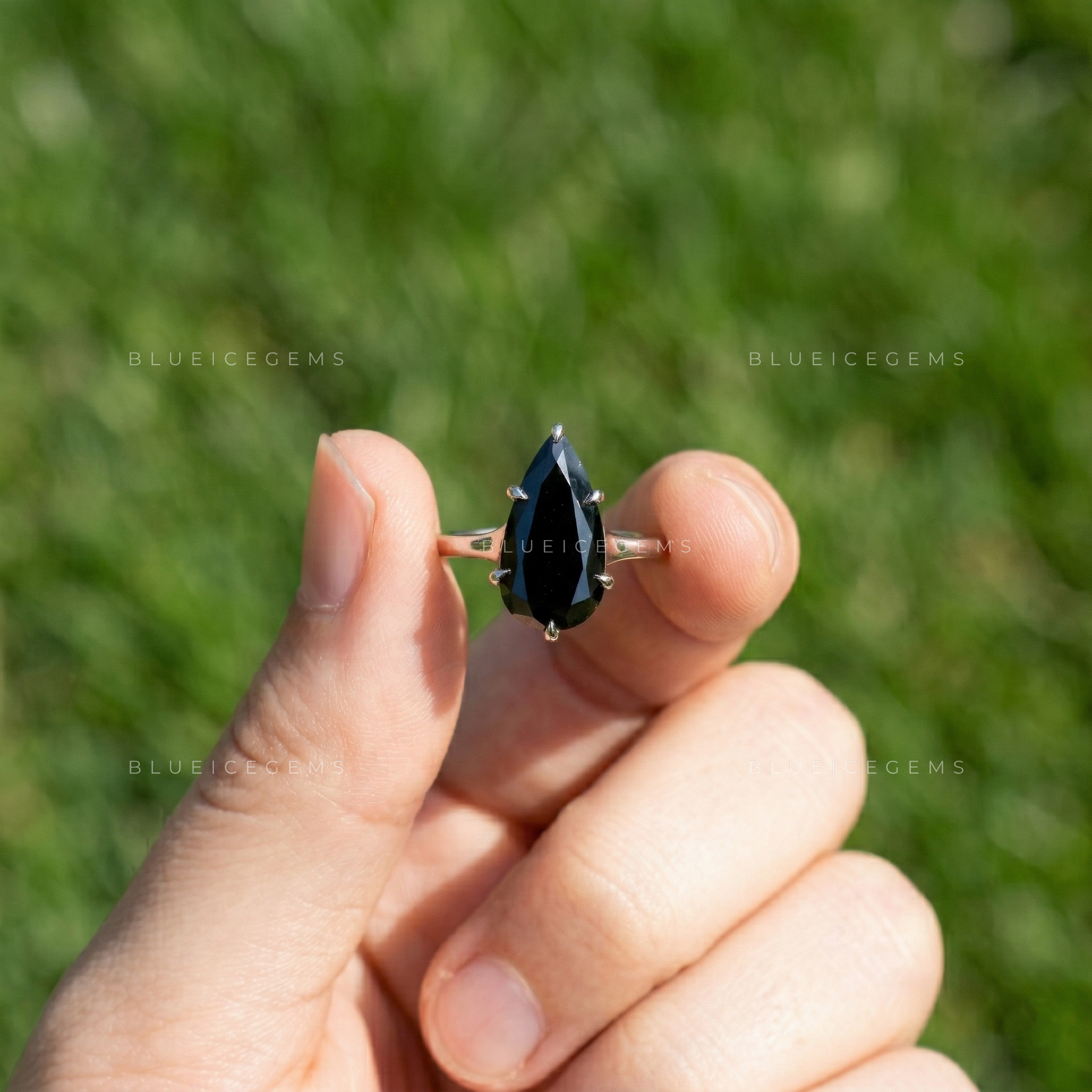 Midnight Noir Pear Cut Moissanite Solitaire Ring