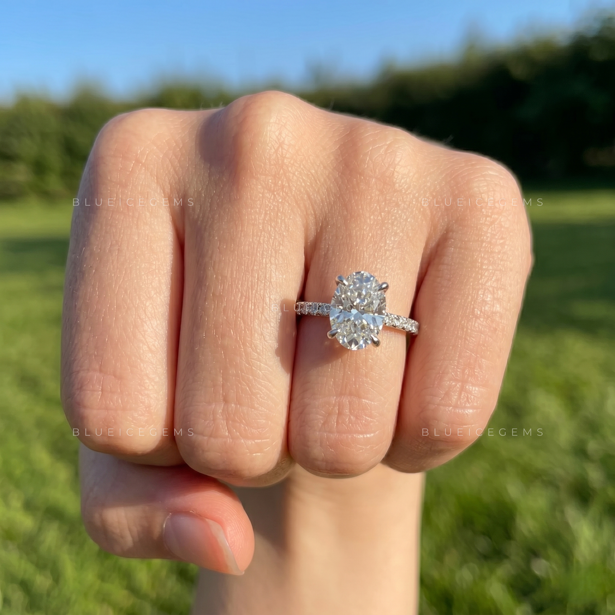 Radiant Oval Brilliant Cut Solitaire Ring with Sparkling Pave Accents