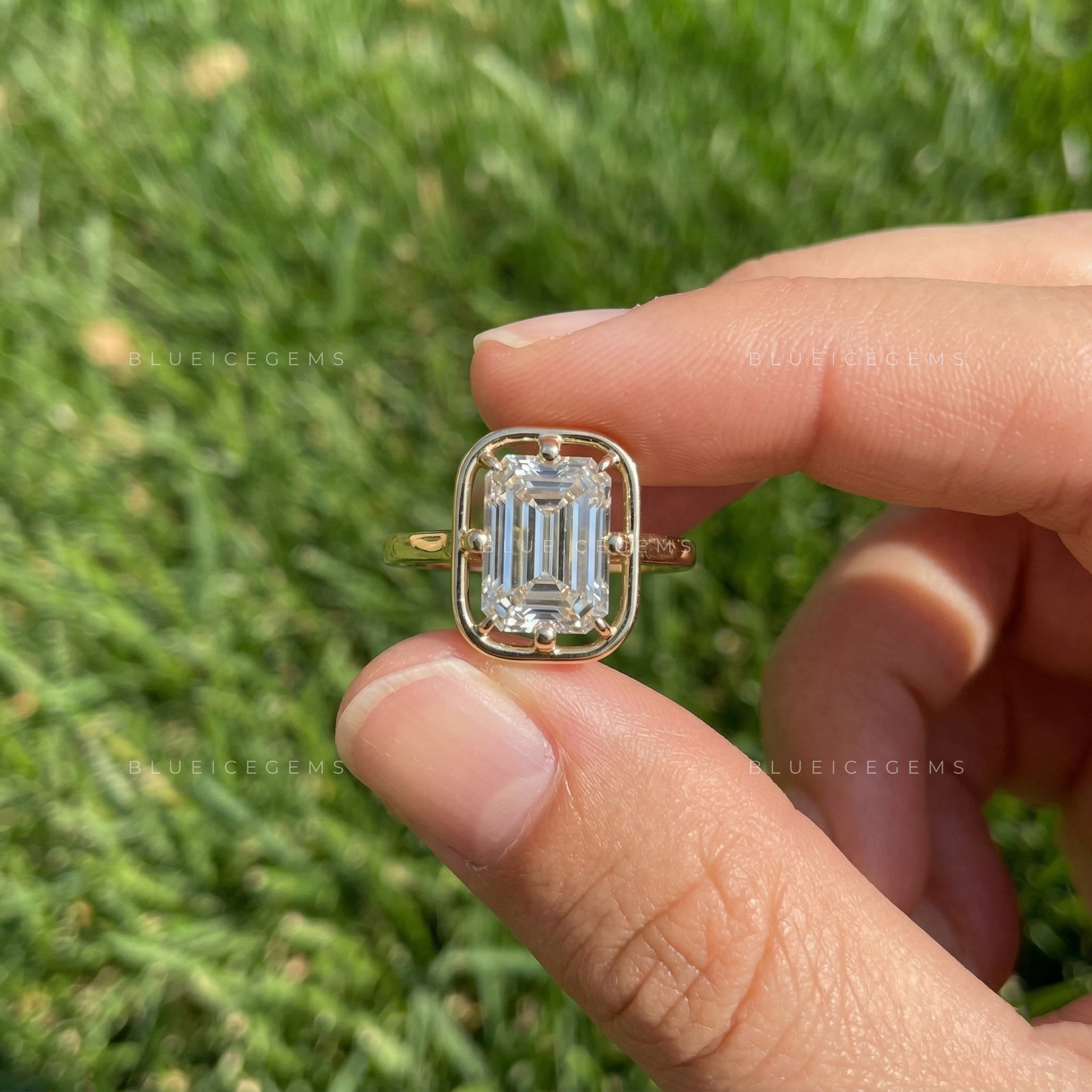 Refined Emerald Cut Solitaire Open Gallery Engagement Ring