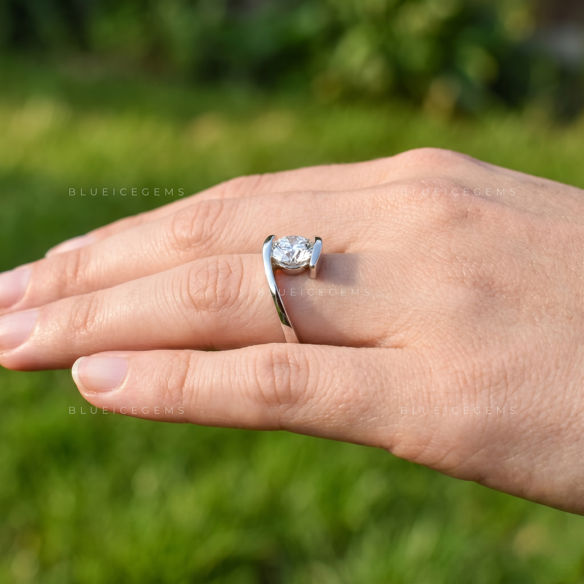 Whispering Grace Round Brilliant Classic Solitaire Engagement Ring