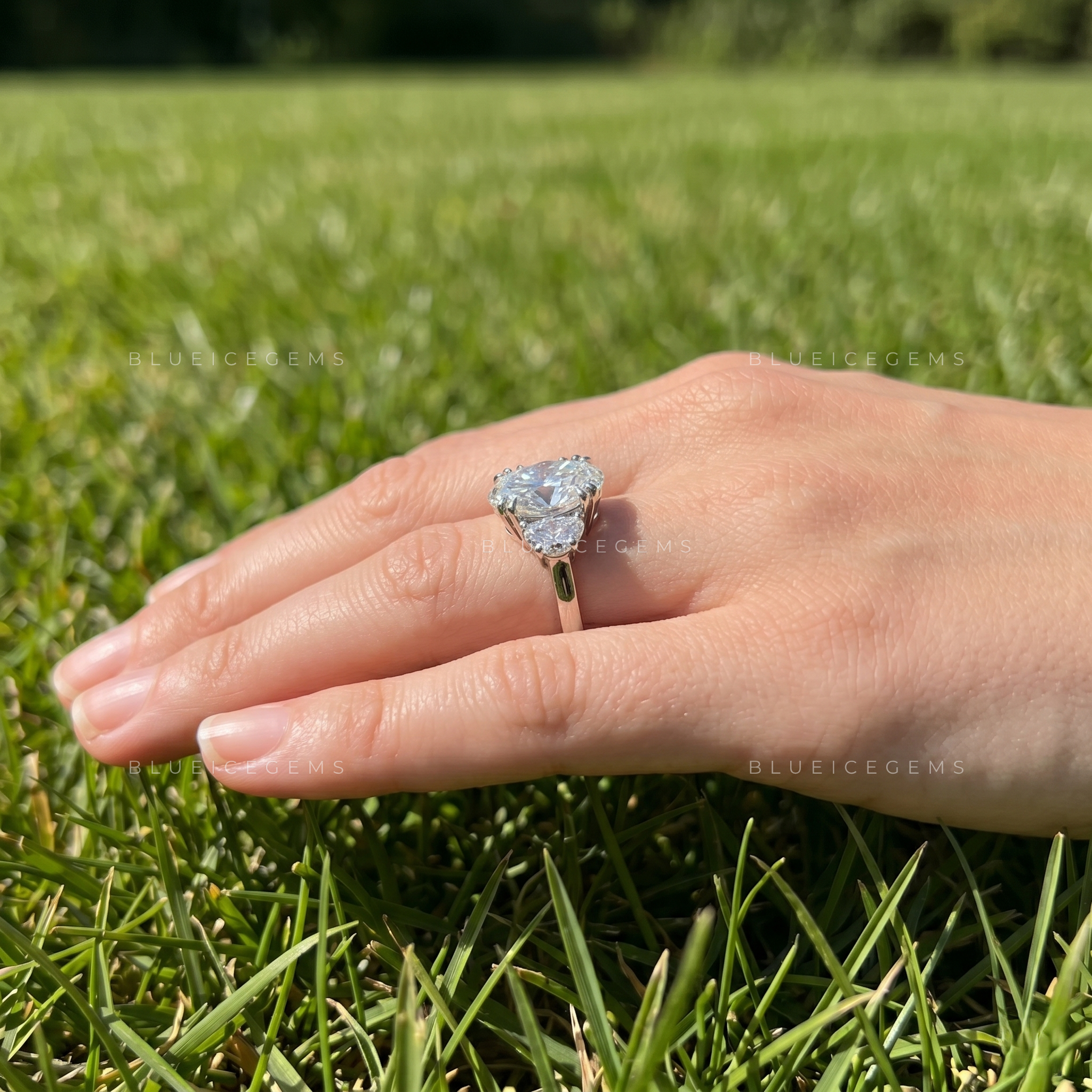 Elegant Symphony Oval Brilliant Cut and Half Moon Three Stone Engagement Ring
