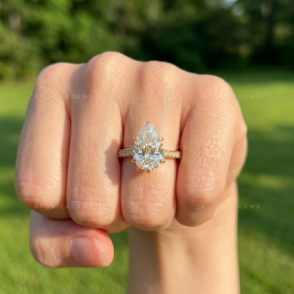 The "Signature Teardrop" Pear & Round Halo: Bold Elegance