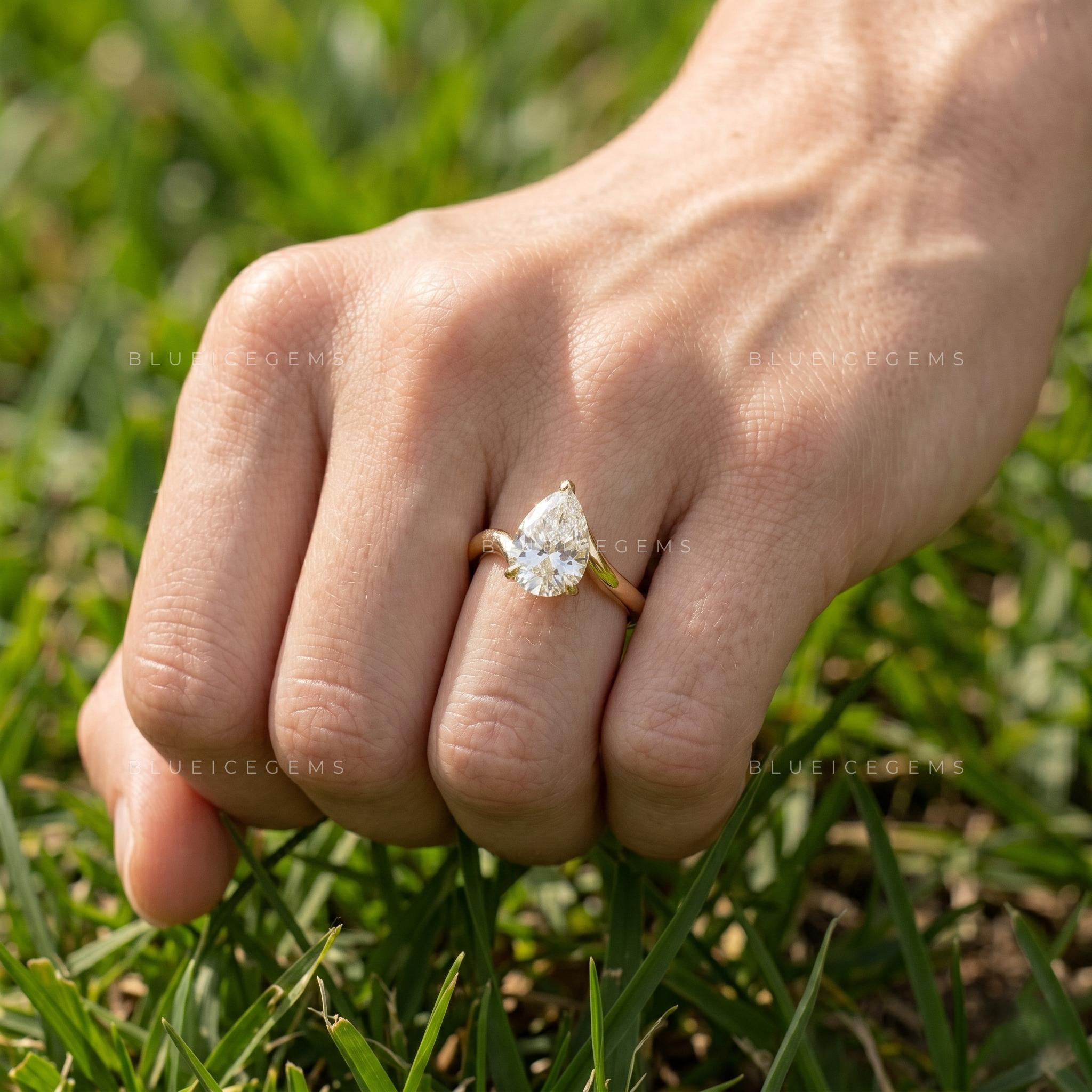 Lunara Tilted Pear Cut East-West Bypass Solitaire Ring