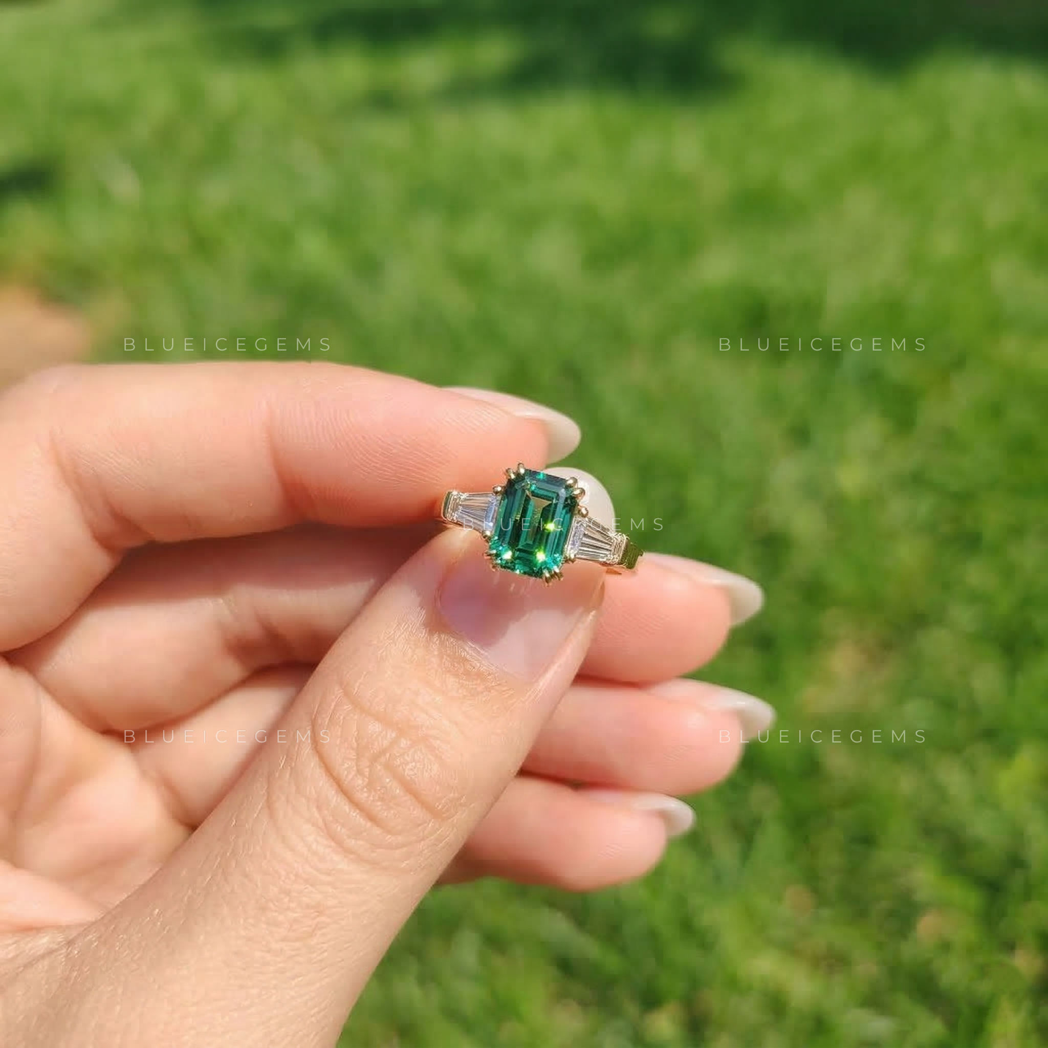 Verdant Elegance Emerald Cut Three-Stone Ring