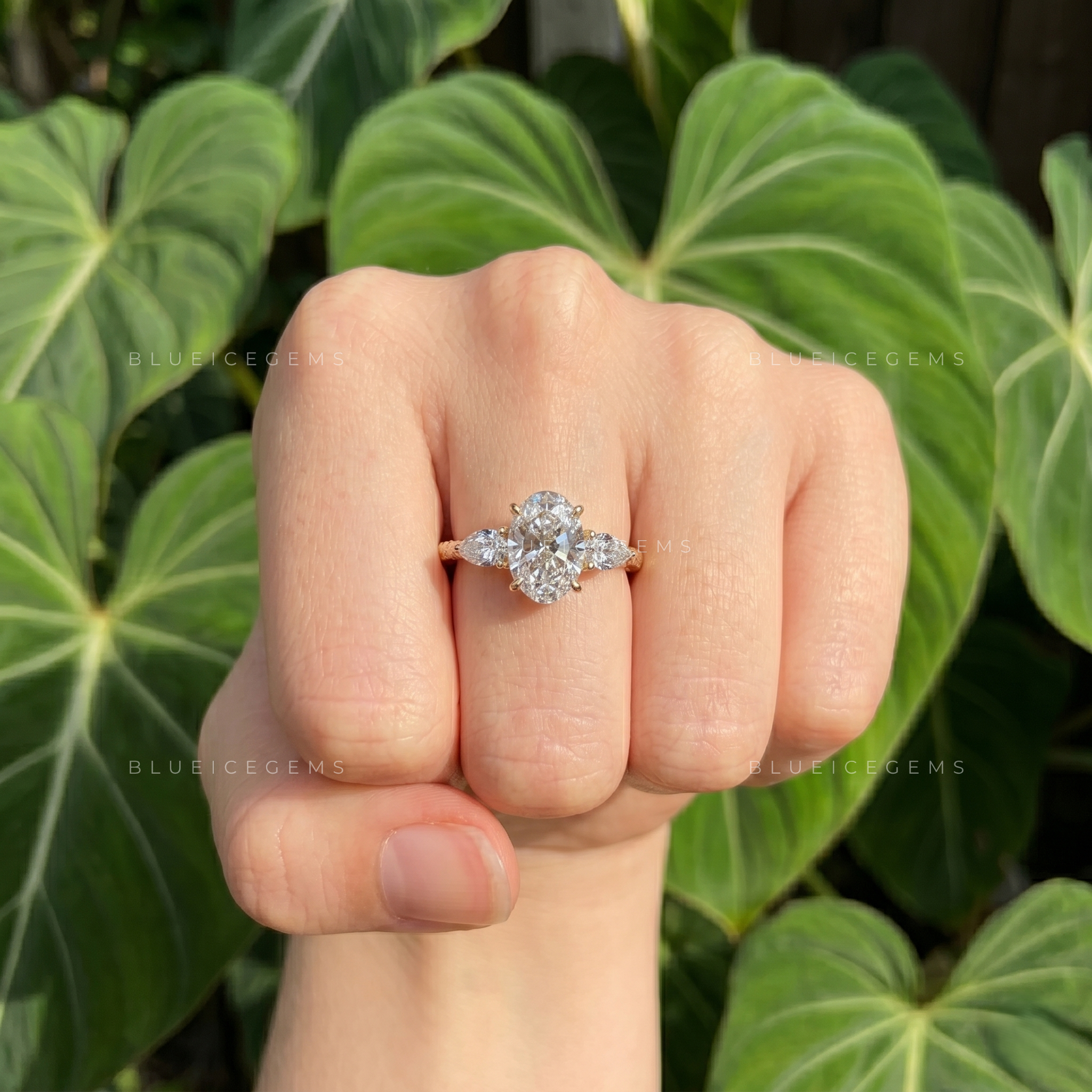 Elegance Unveiled Oval Cut Trilogy Engagement Ring with Pear Accents