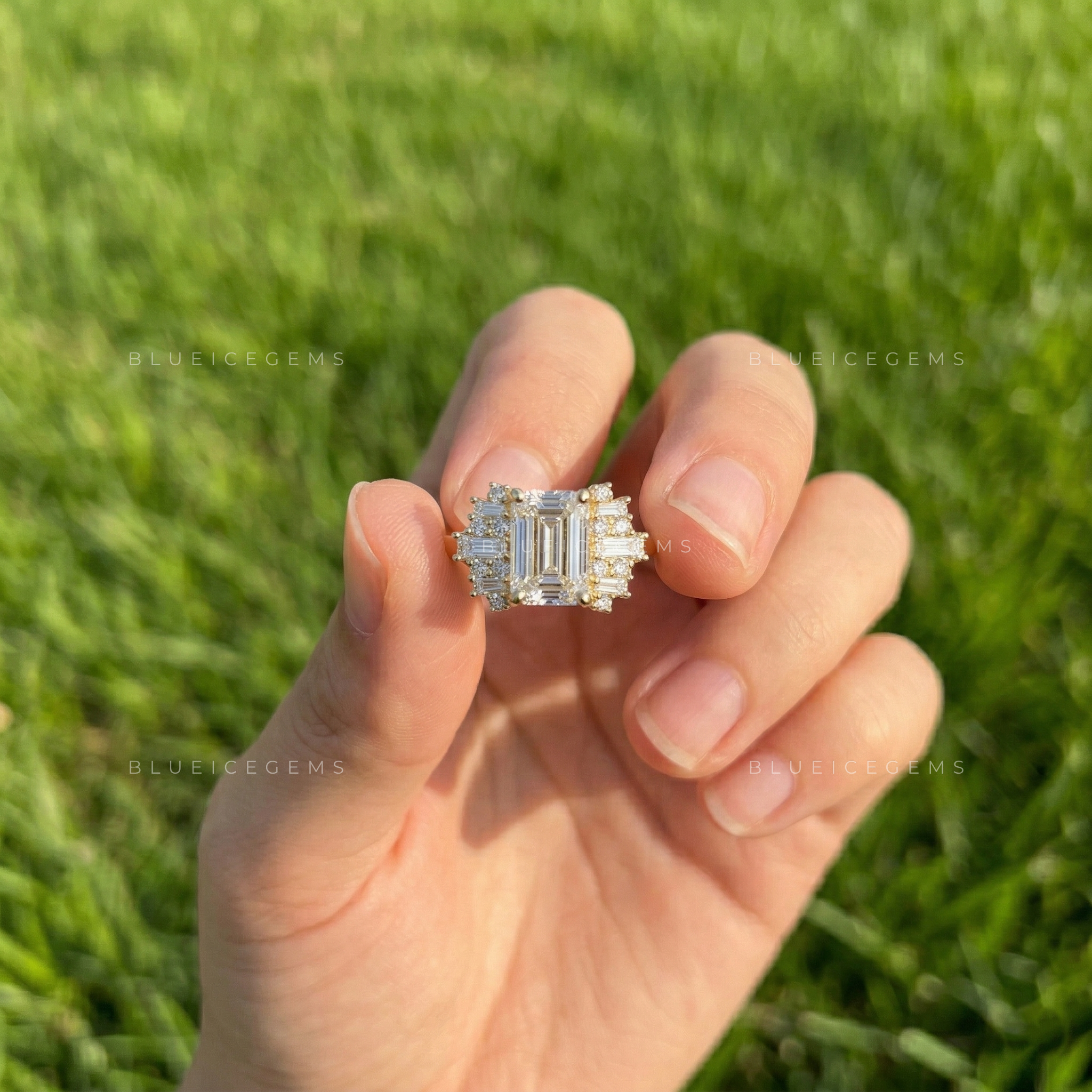 Sophisticated Emerald Cut Three Stone Side Tapered Baguette Engagement Ring