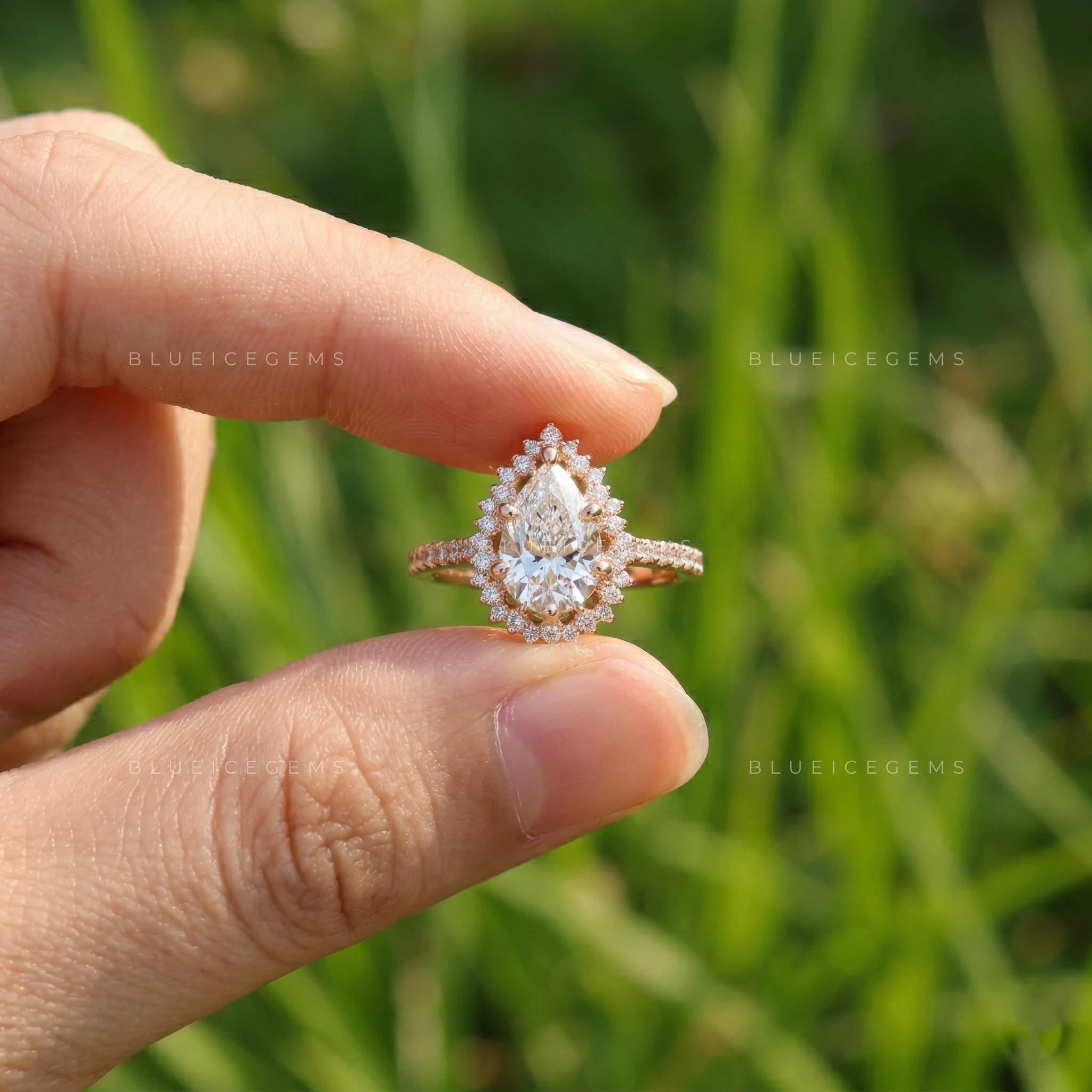 Graceful Pear Cut Halo Side Stone Engagement Ring