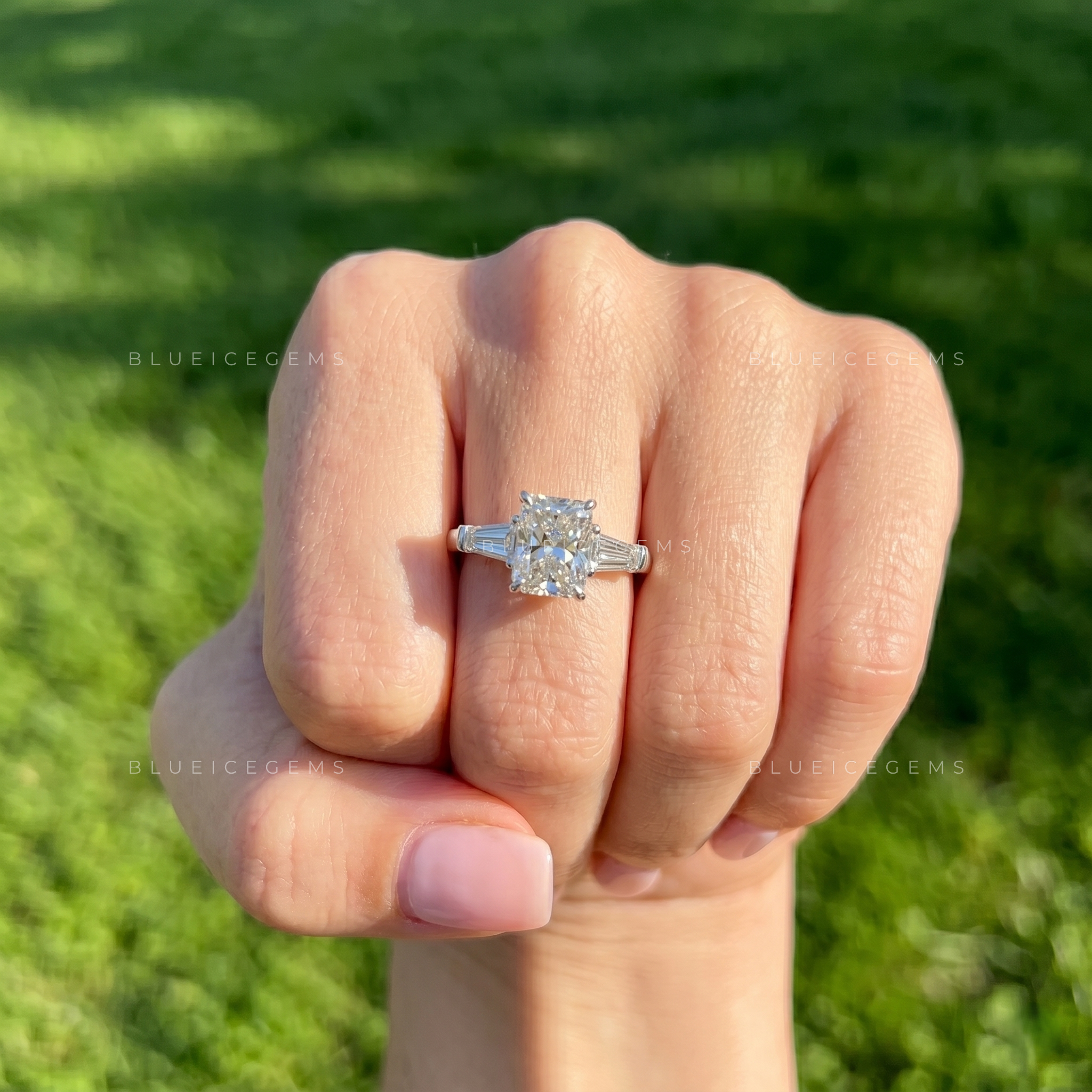 Classic Grace Emerald Cut Three Stone Engagement Ring