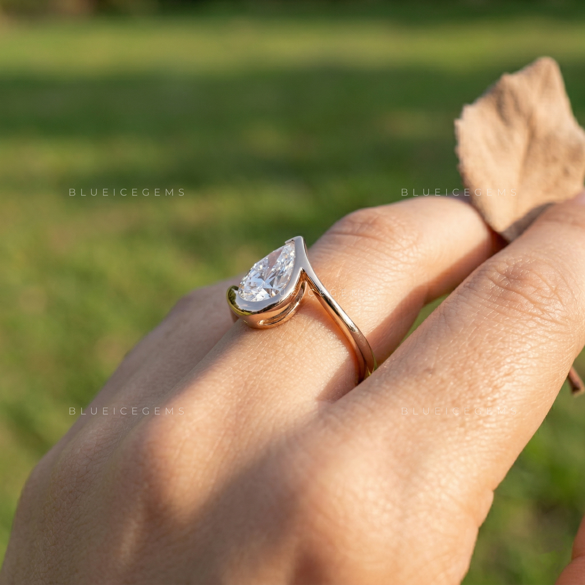 The "Signature Silhouette" Pear Cut Bezel Solitaire: Modern Icon