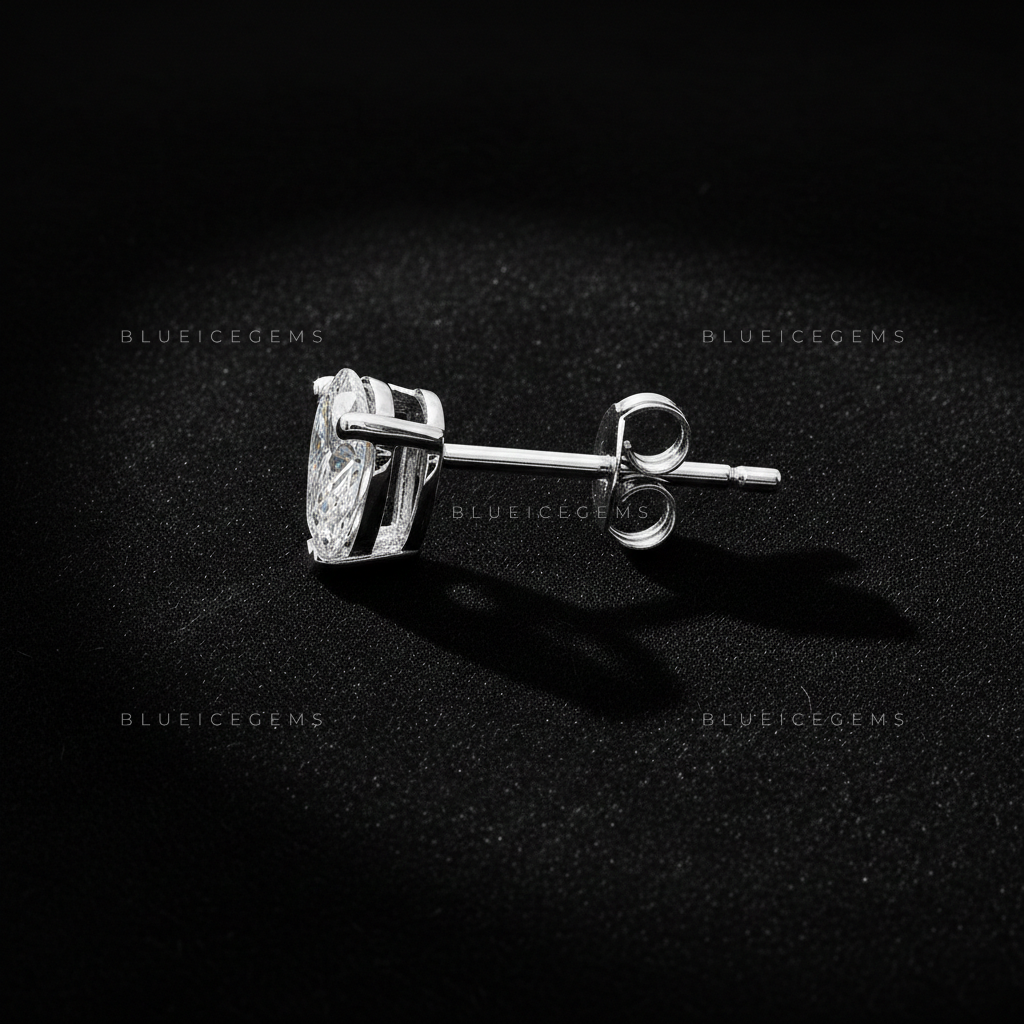 The Teardrop Zenith: Pear Diamond Stud Earrings
